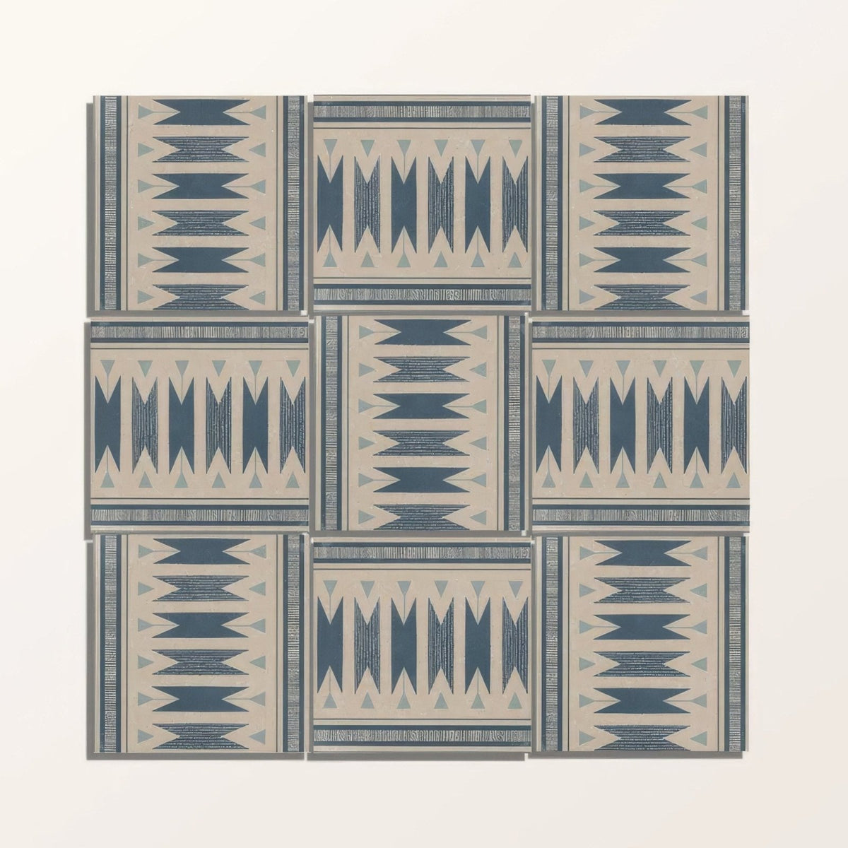Adventuras ziggy border blue porcelain tile with geometric pattern in muted blue beige and gray tones and textured finish