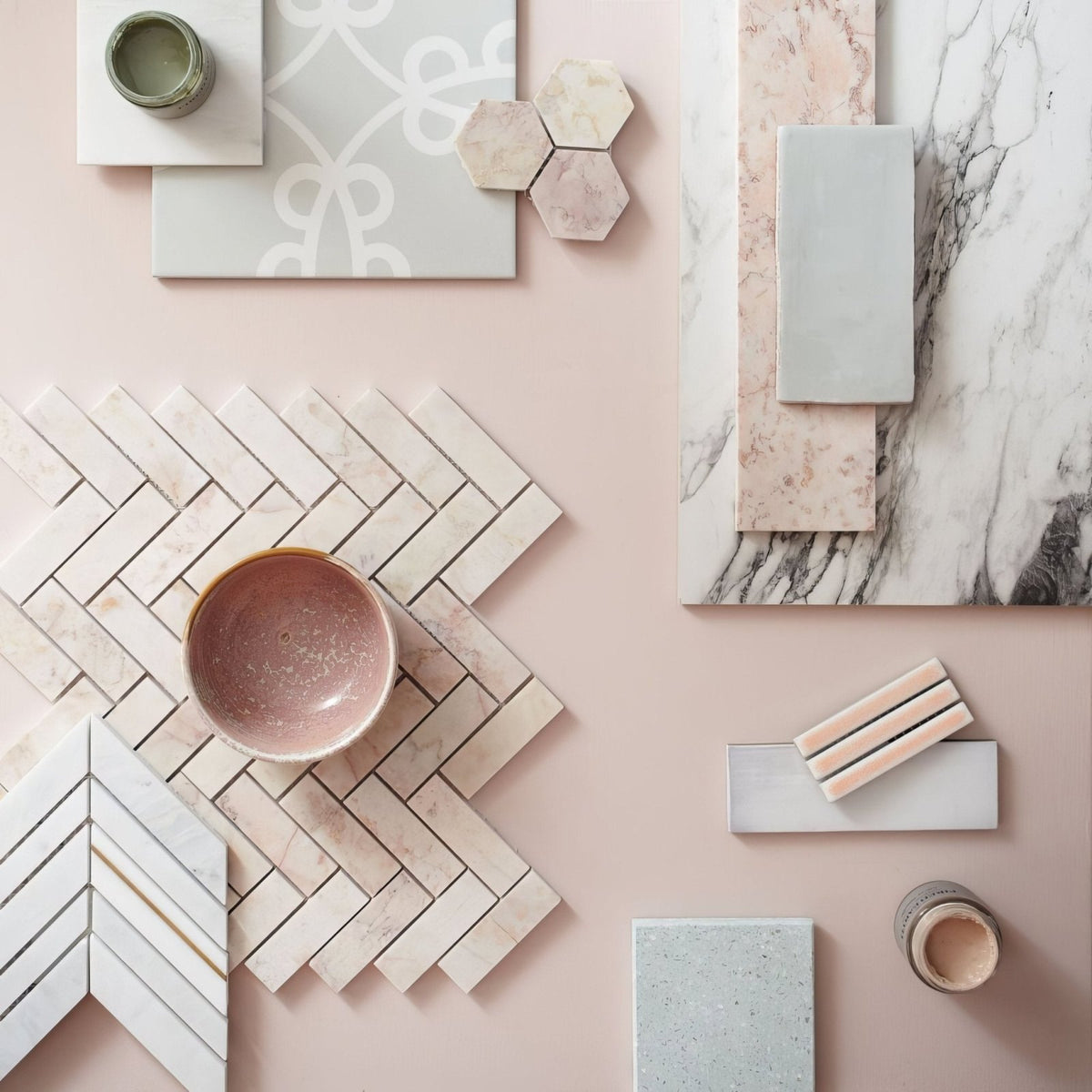 Aegean Pink Scallop Marble Mosaic pink marble scallop mosaic with a herringbone pattern styled with a blush pink ceramic bowl