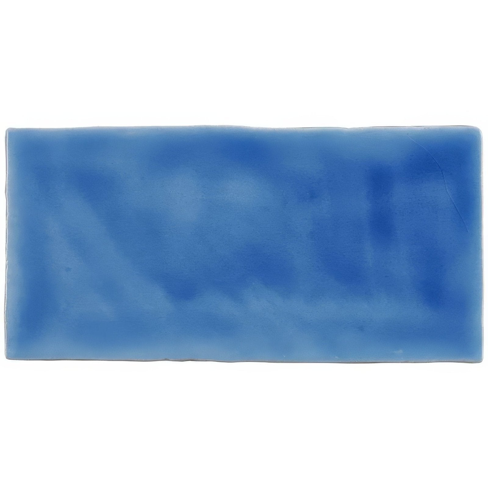 A rectangular ceramic agapanthus brick tile with a smooth glossy surface and blue gradient hues