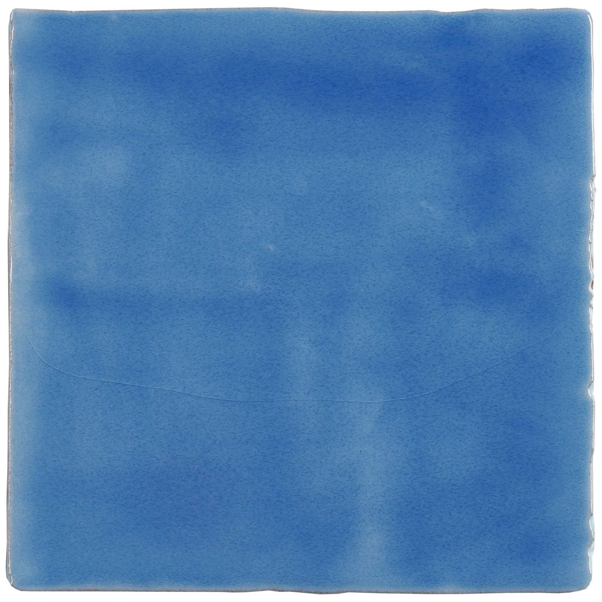 A square matte blue ceramic tile with subtle hue variations and textured surface agapanthus field tile