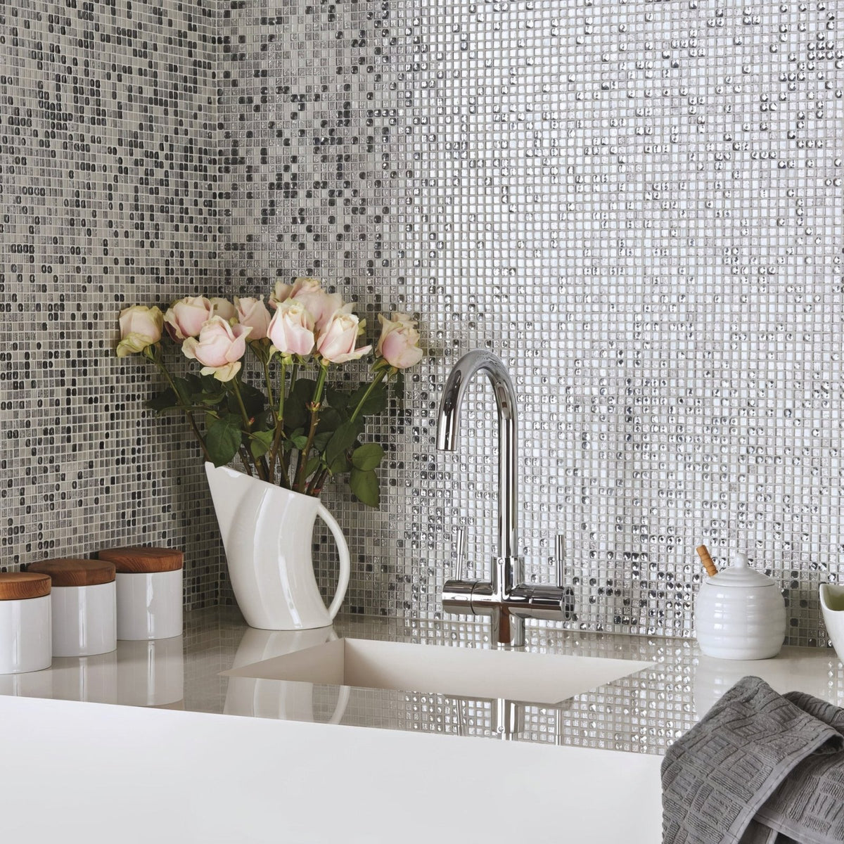 Agra Sparkling Mosaic silver sparkling glass mosaic shown with a chrome dual-handle tap