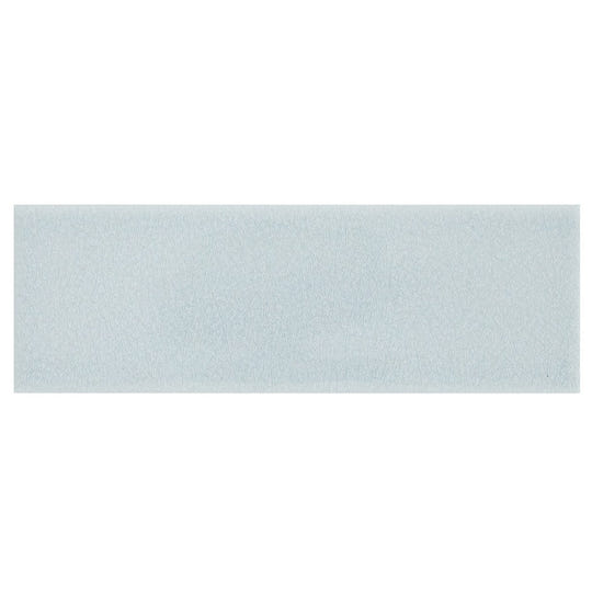 Alhambra blue 7.5 x 22.5 rectangular glazed ceramic tile with matte finish and subtle textured light blue surface