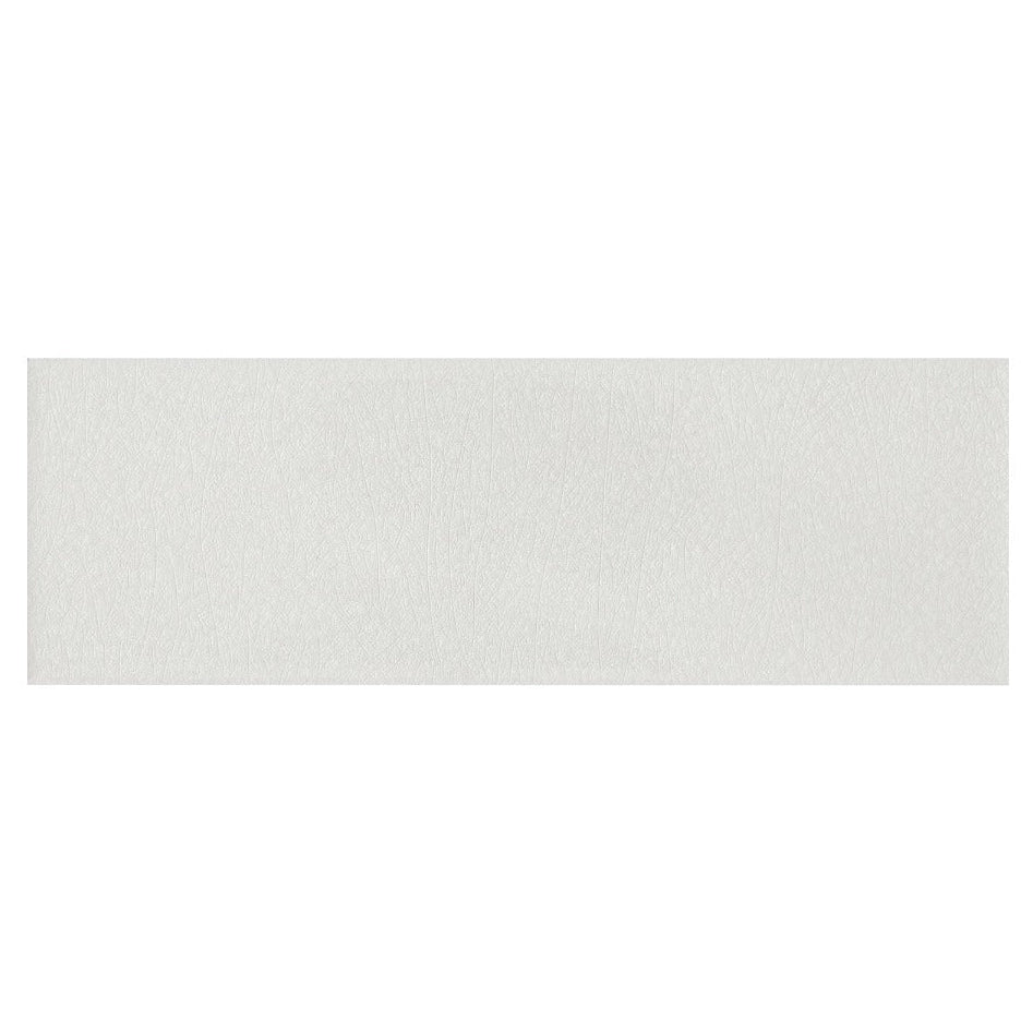 A sleek rectangular white glazed tile with a subtle textured surface alhambra grey 7.5 x 22.5 inches