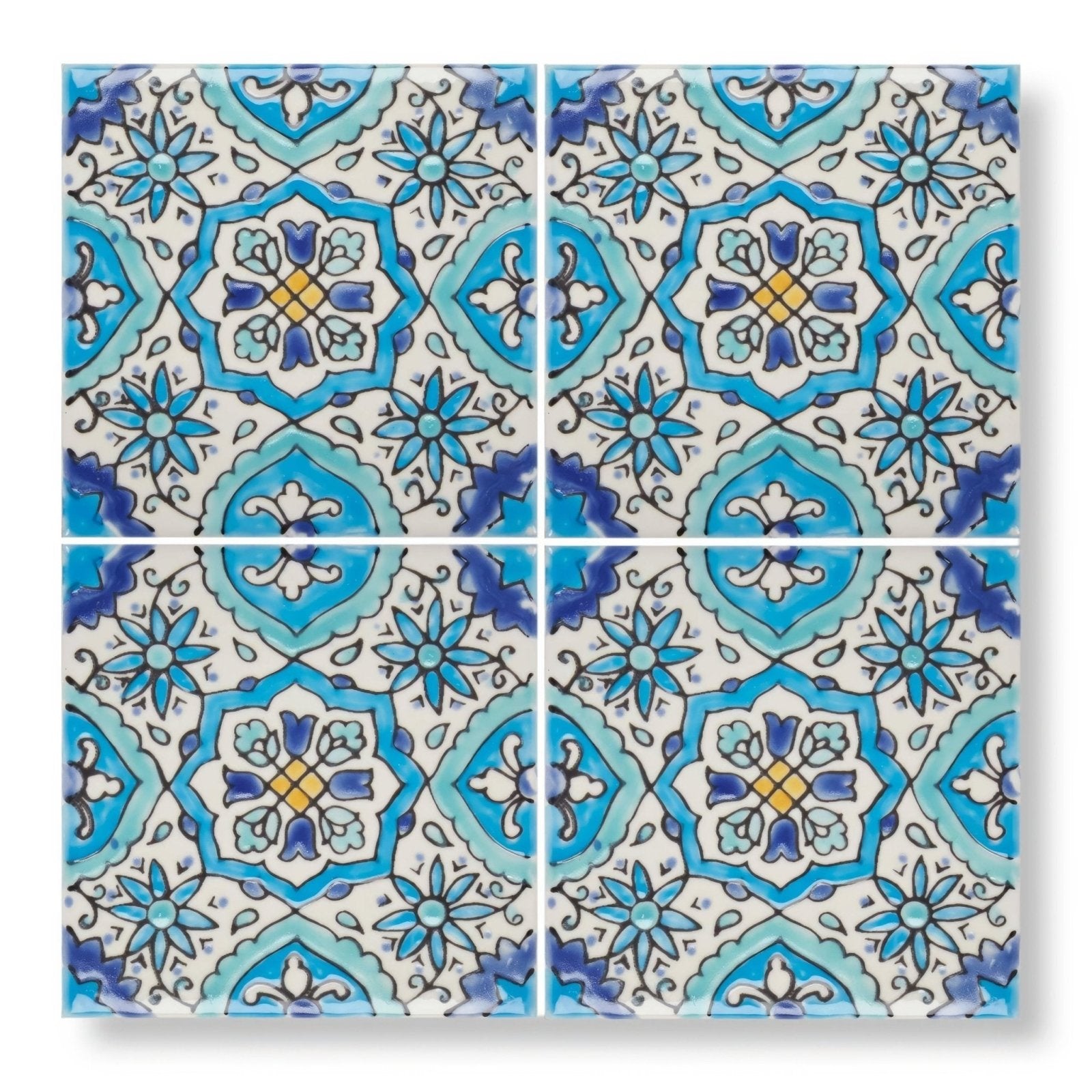 Blue and turquoise patterned ceramic wall tiles with intricate floral designs from Andalucia Belmez patterned tile collection