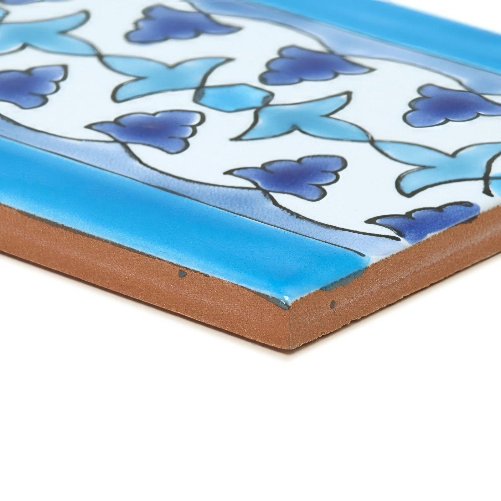 Andalucia bodegas patterned border rectangular ceramic tile with glossy blue and white floral design and dark blue blossoms
