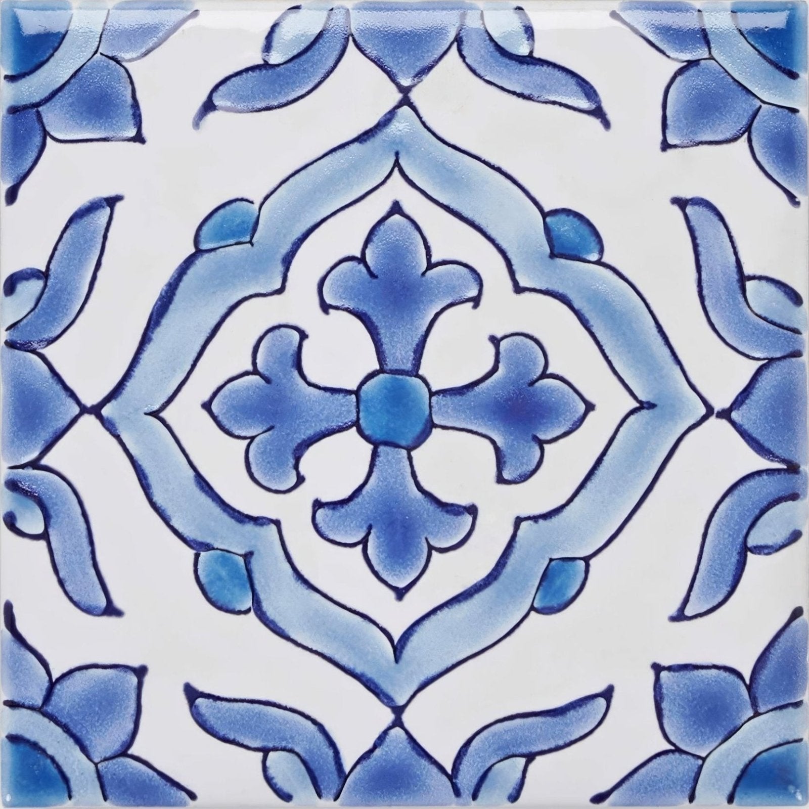 Blue and white ceramic tile with intricate floral and geometric patterns from the andalucia jerez collection