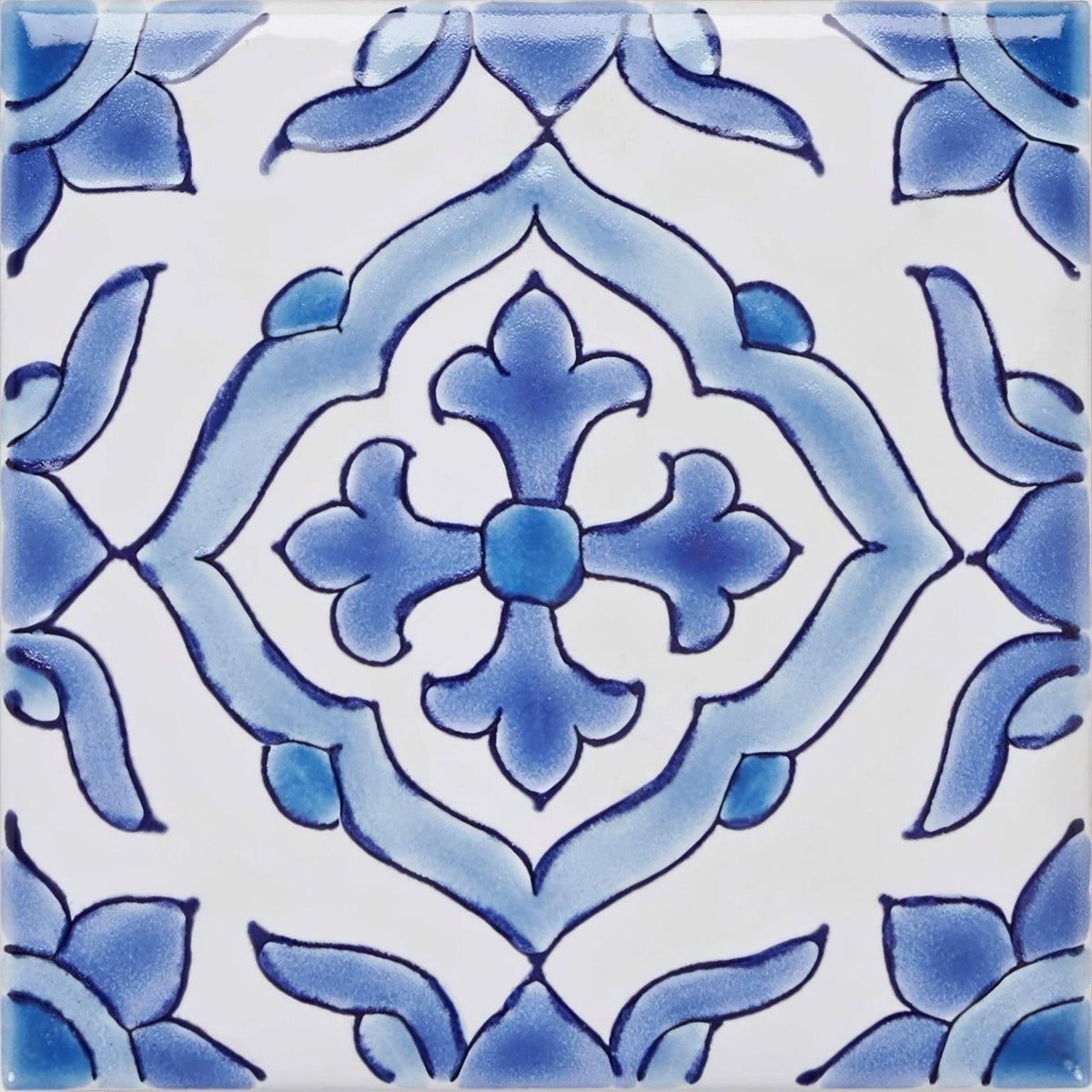 Blue and white ceramic tile with intricate floral and geometric patterns from the andalucia jerez collection