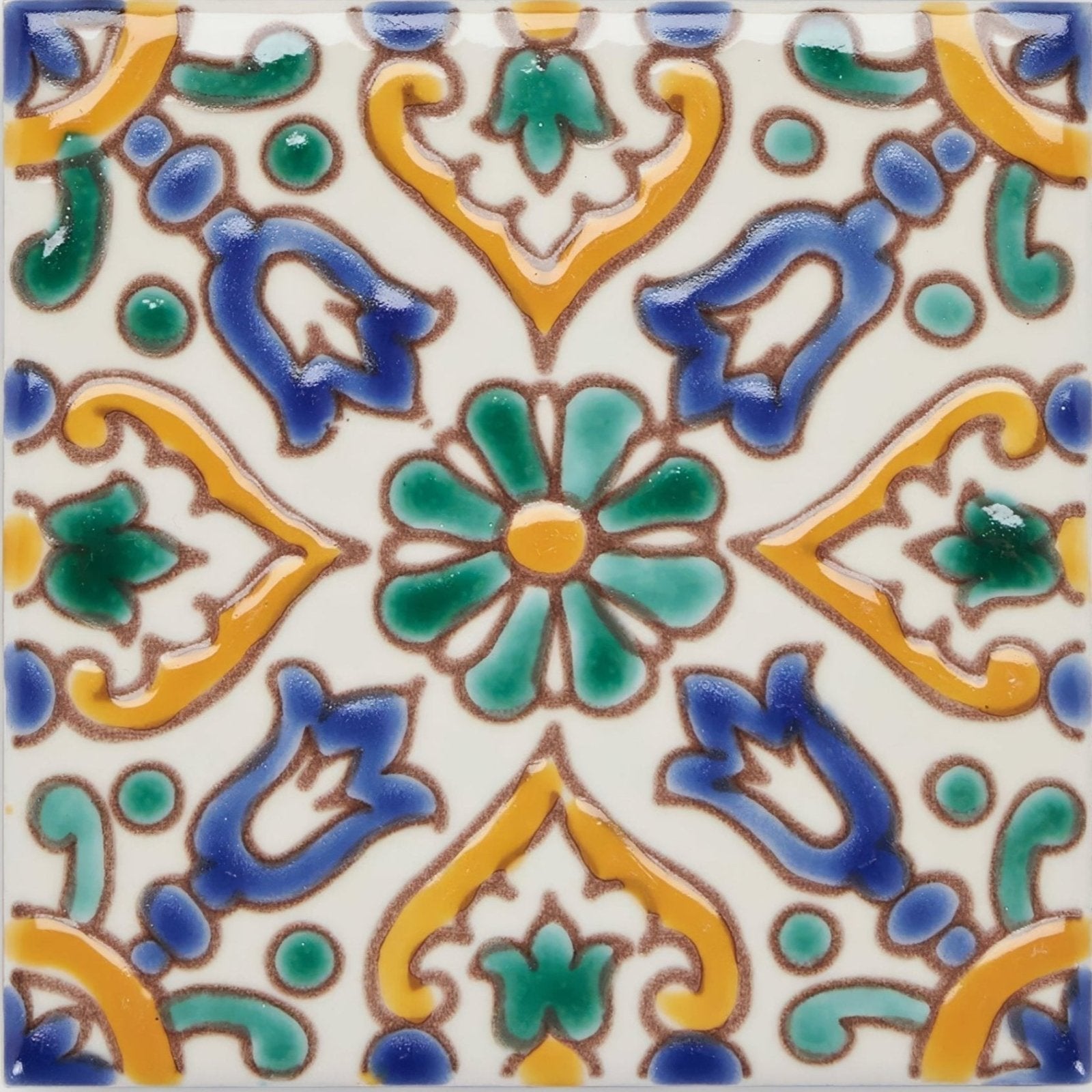 A square ceramic andalucia medina patterned tile with vibrant blue green yellow and brown floral and geometric design