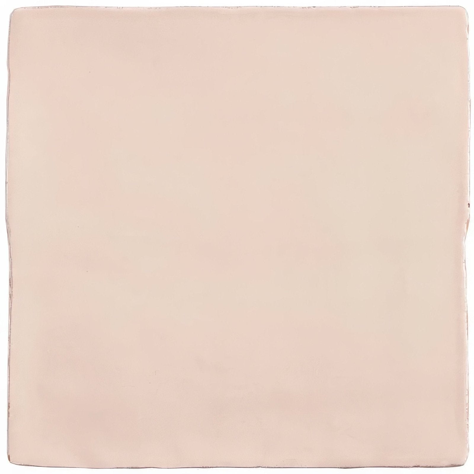 A square matte finished ceramic tile in soft blush pink from the anemone field tile collection
