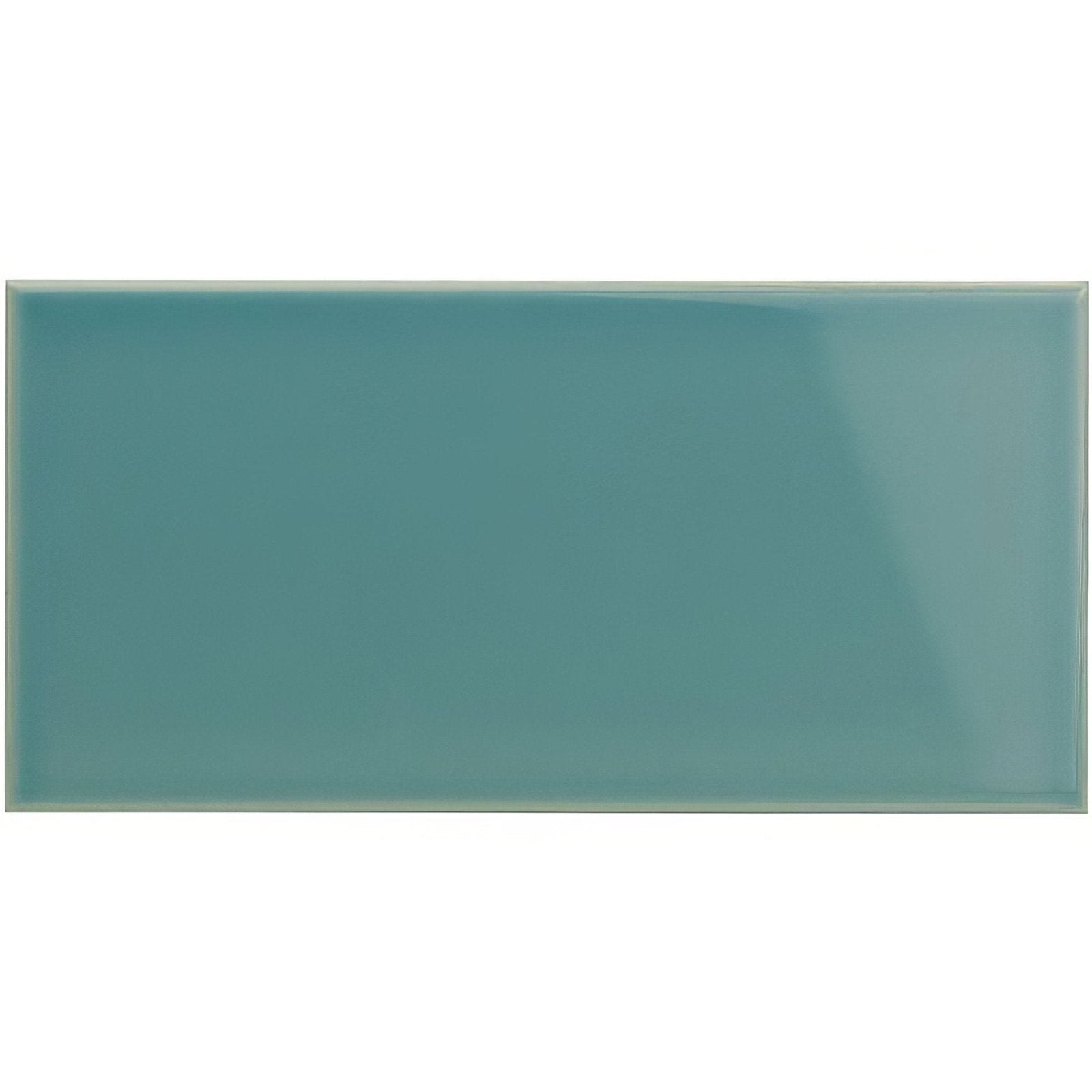 Aqua Source half tile in sleek glossy teal ceramic with a smooth rectangular surface for wall or backsplash use