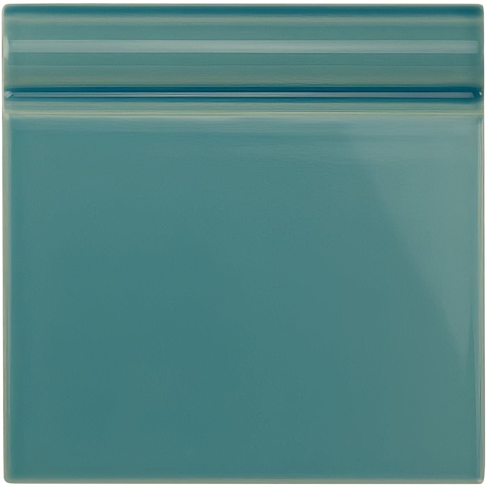 Aqua Source skirting tile square glossy teal ceramic with subtle horizontal ridge detail along the top edge