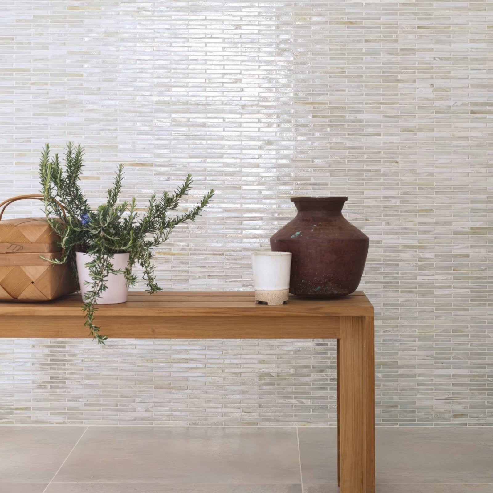 Arabian Sea Pasni glass mosaic white and beige glass mosaic styled with a light wood bench