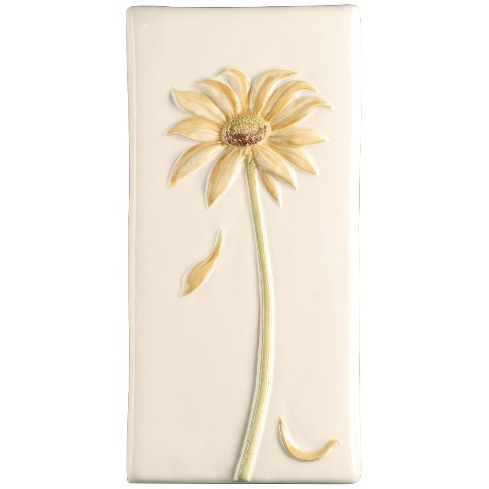 Cream-colored ceramic wall tile arctotis with raised daisy featuring pale yellow petals and textured brown center on off white