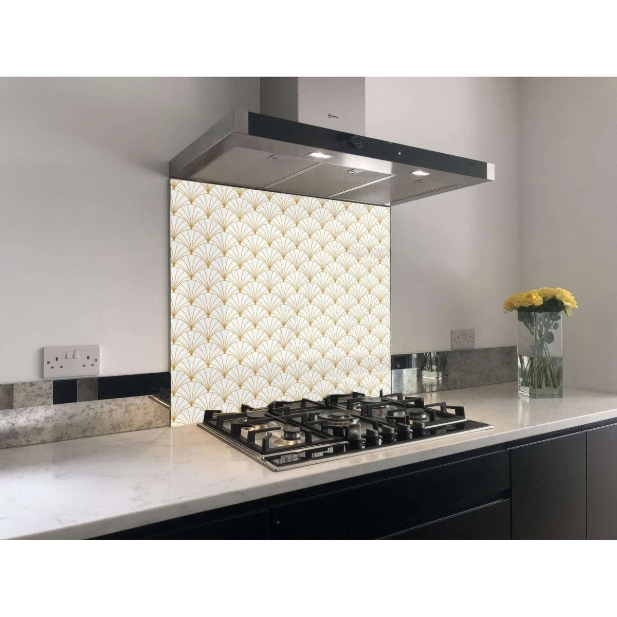 Gold and white geometric patterned glass kitchen backsplash from art deco sunrise fan shower panel design