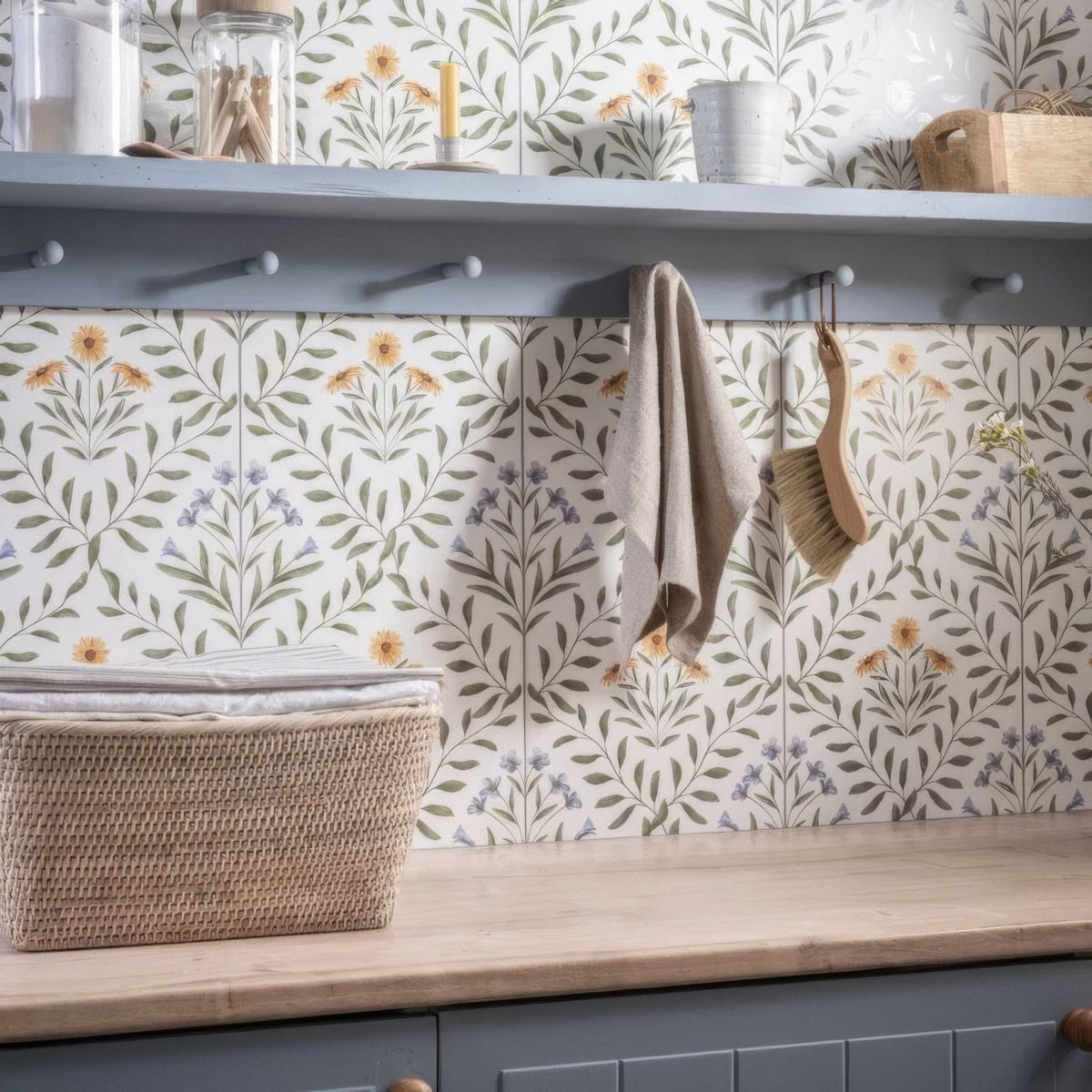 Beige linen towel hanging from gray wooden rack for Arts & Crafts Flora Blue 60x30cm product display