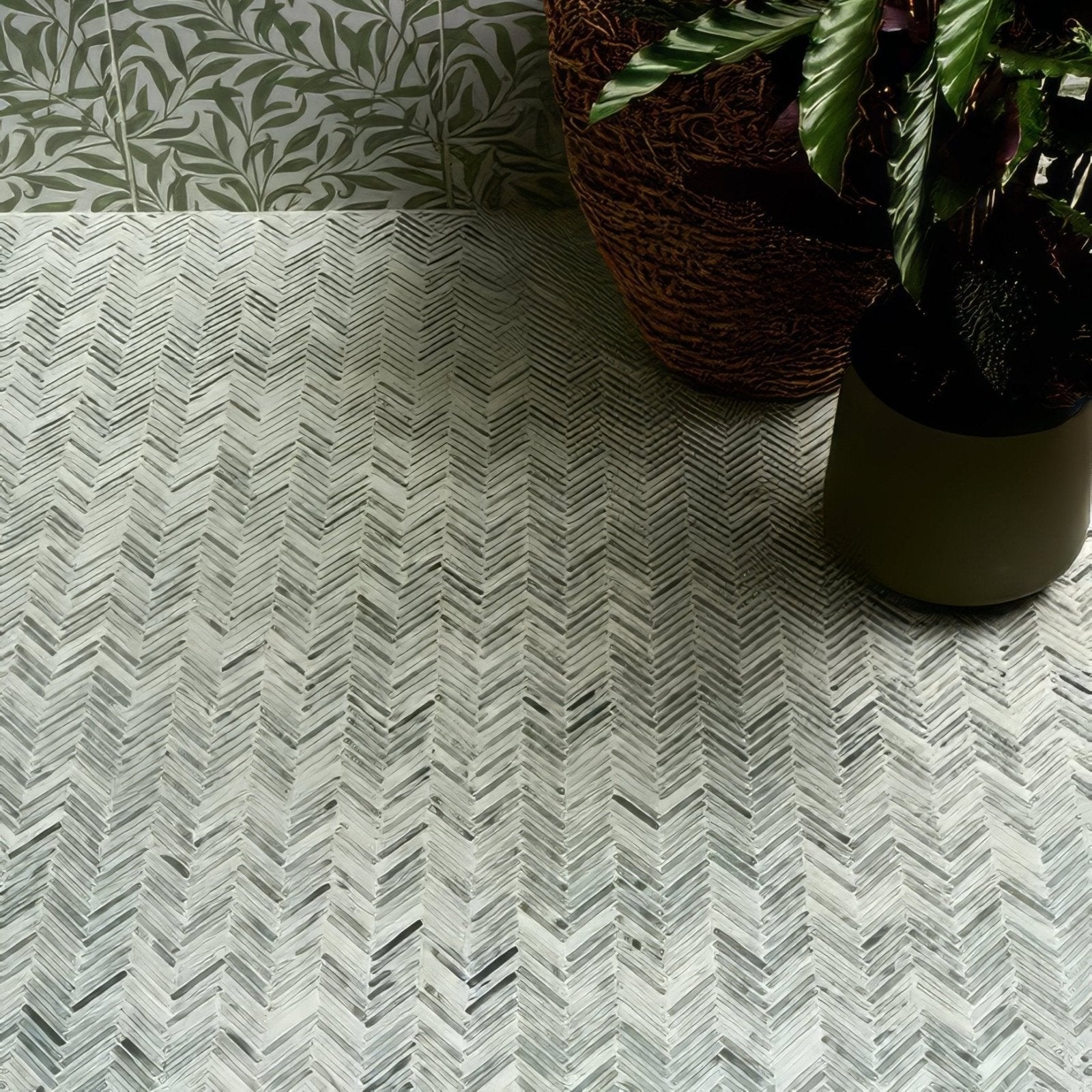 Herringbone patterned athens mint marble mosaic tile floor in white and gray tones