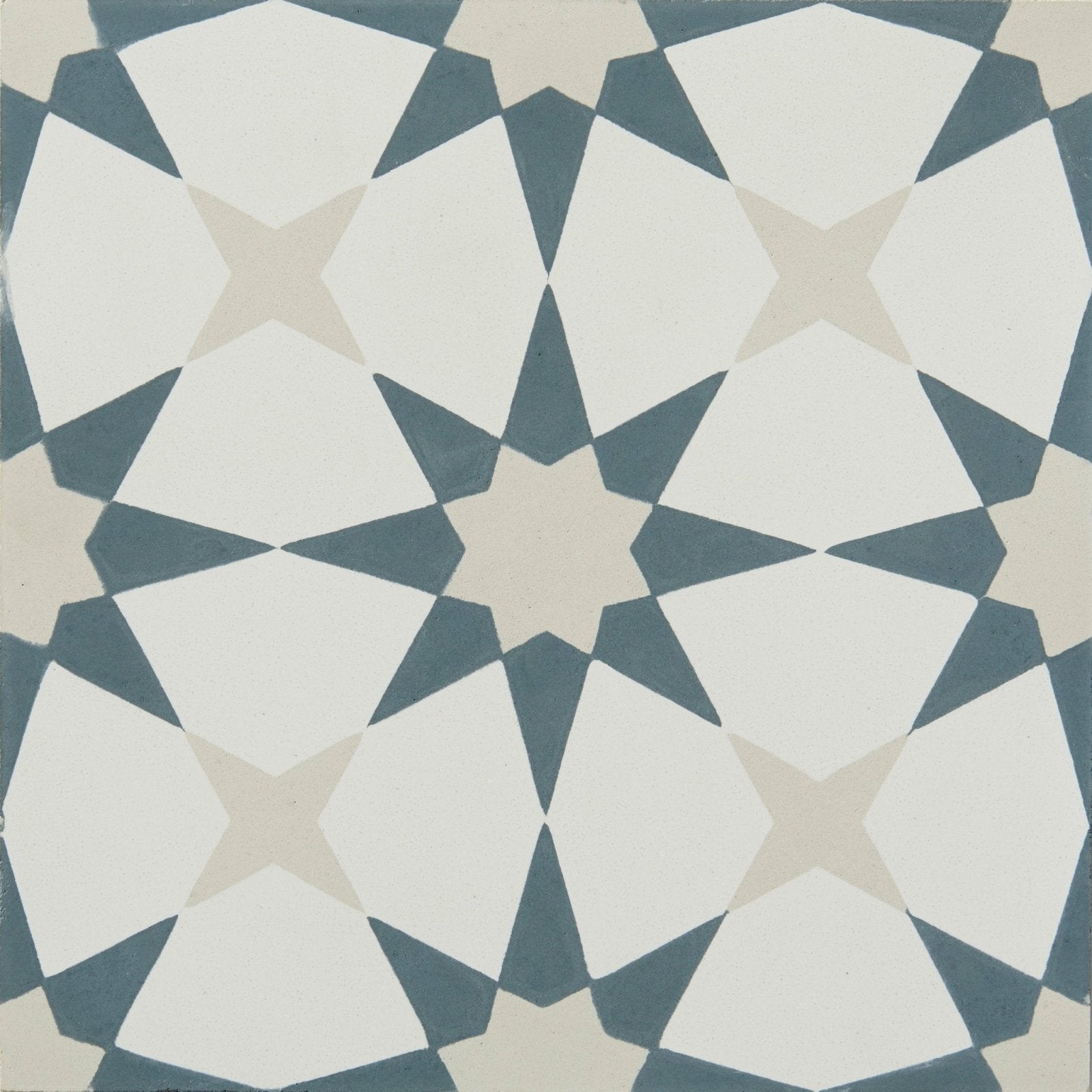 Geometric atlas porcelain denim tile featuring a repeating star pattern in white slate blue and beige
