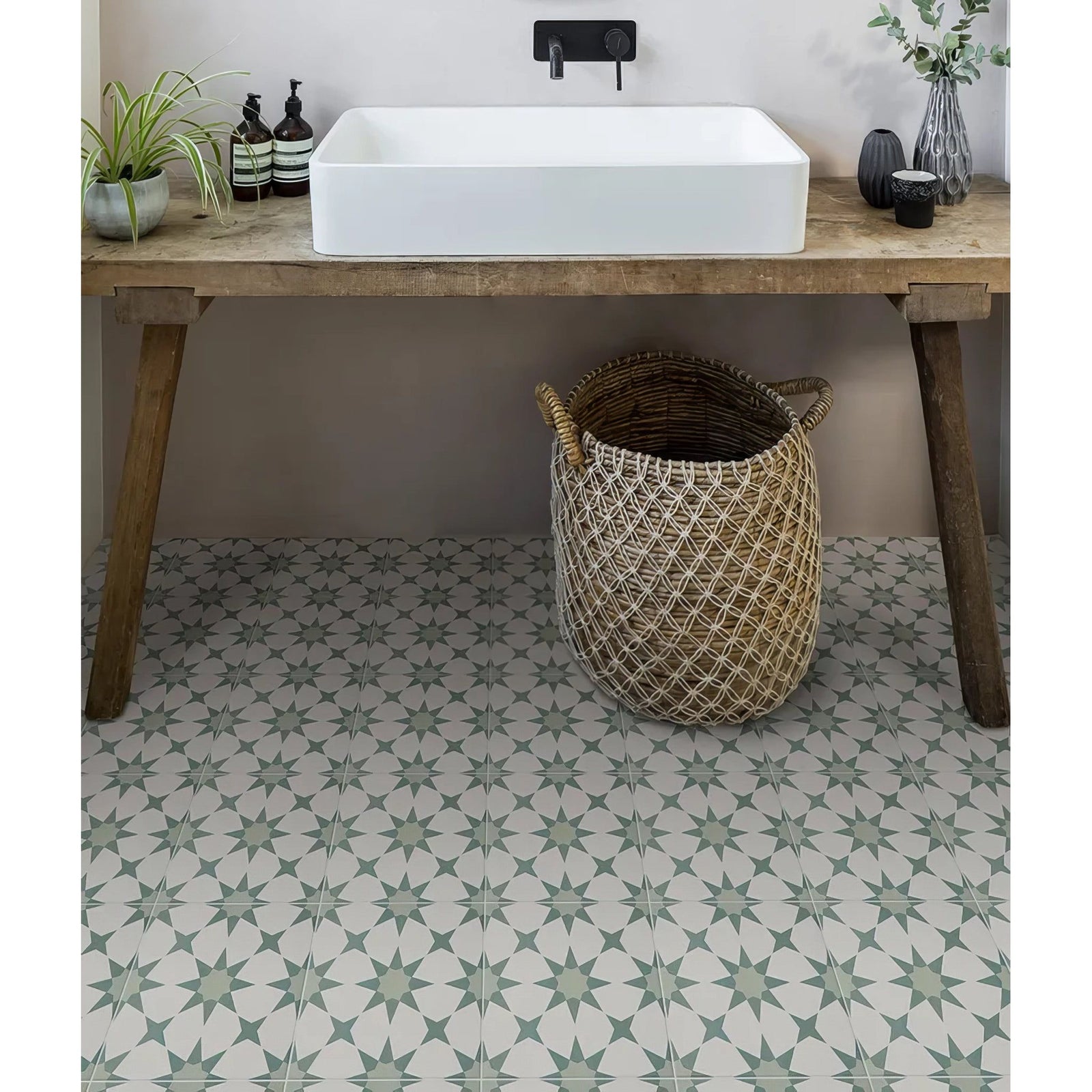 Woven wicker basket with handles in porcelain green for stylish storage and decor use