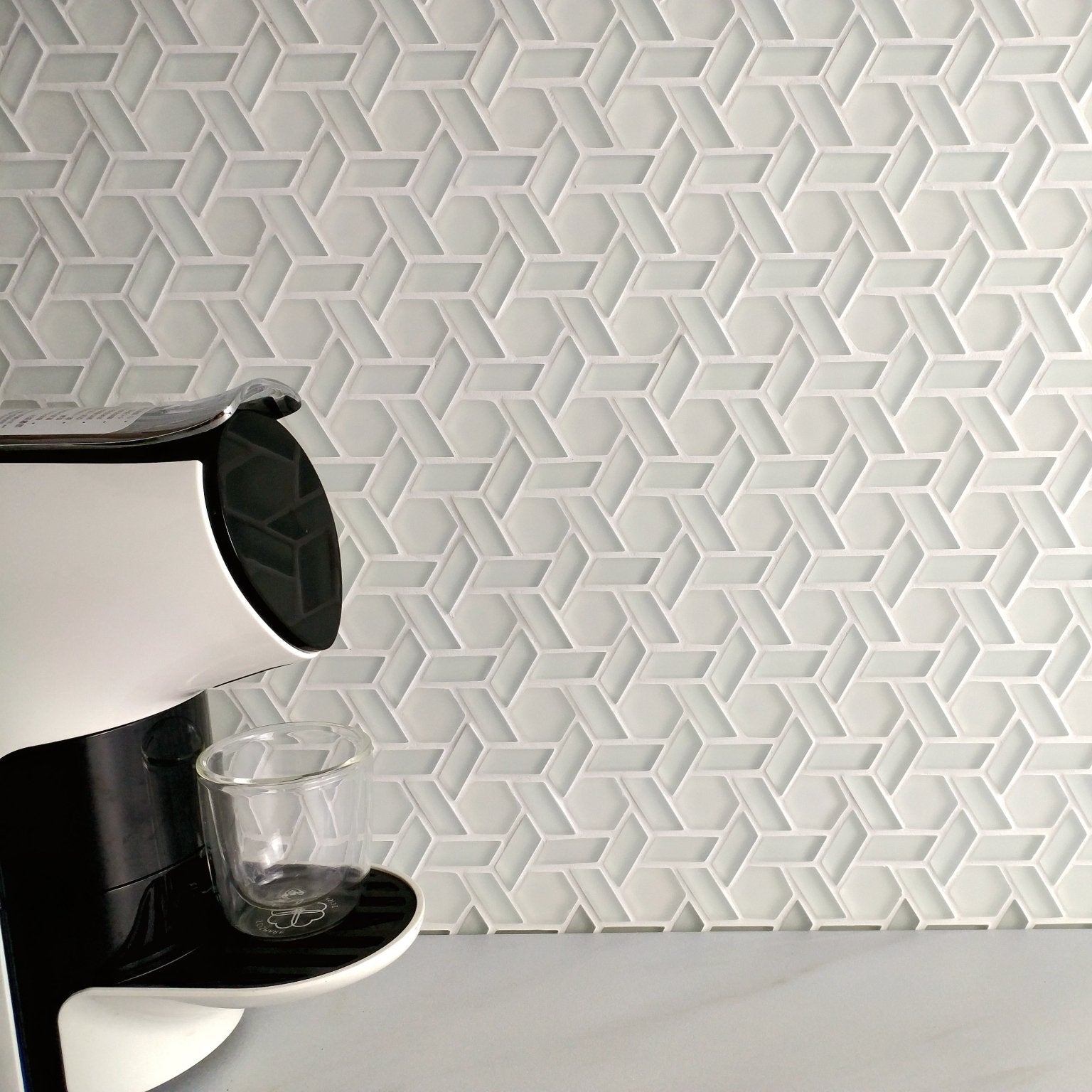 Aurora Woven White Mosaic white geometric glass mosaic styled with a coffee maker