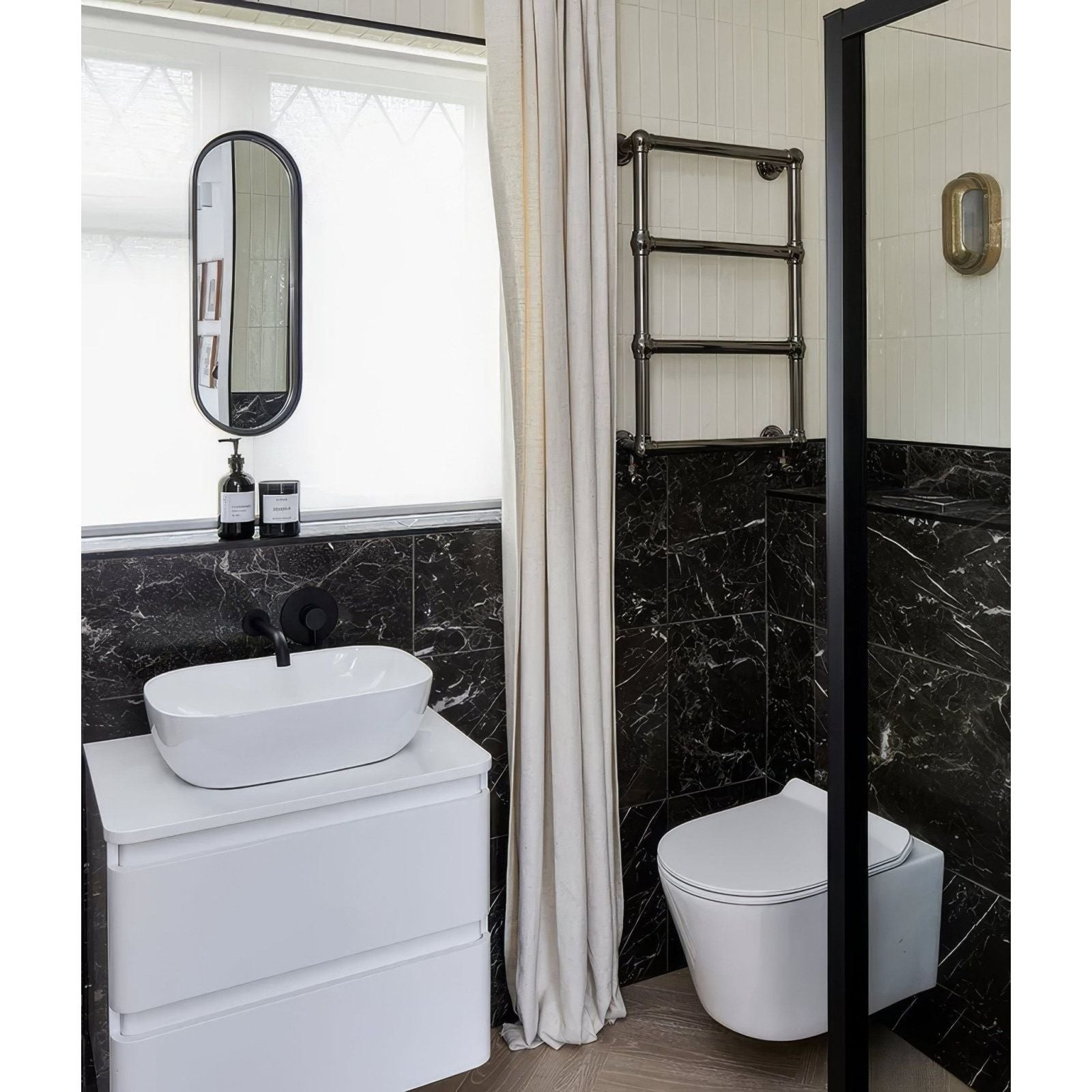 Avebury ceramic parchment white ceramic vessel sink with sleek modern design on matching white vanity cabinet