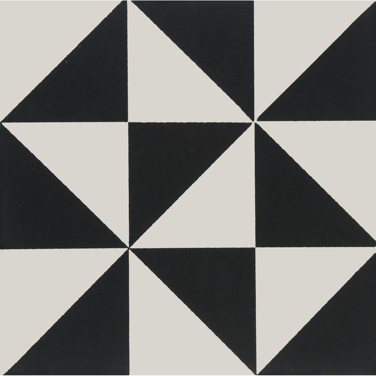 Avignon black on dover white geometric tile featuring a black and off-white starburst pattern for flooring or walls