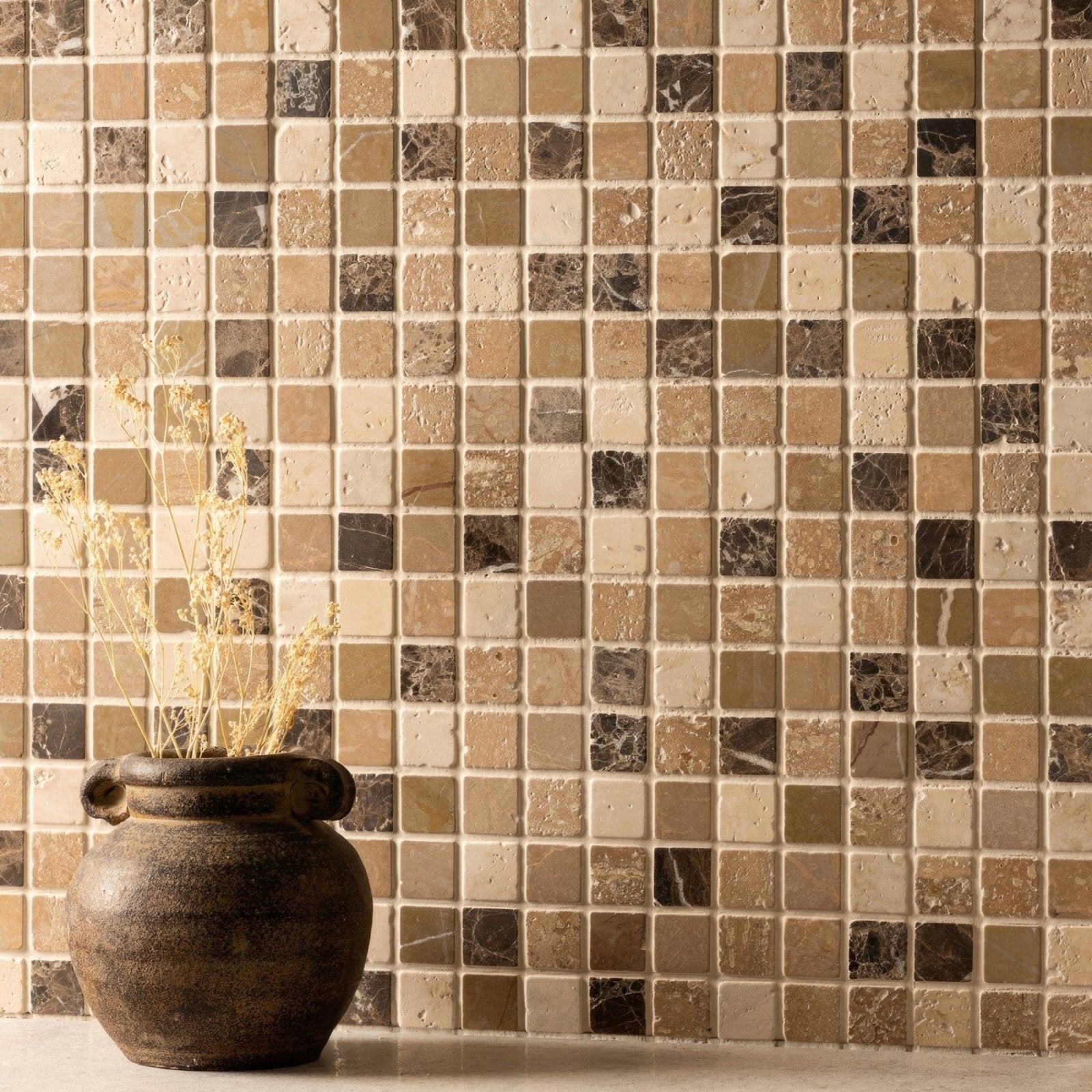 Azahar Venetian Mosaics beige, brown and black marble mosaic styled with an earthenware pot