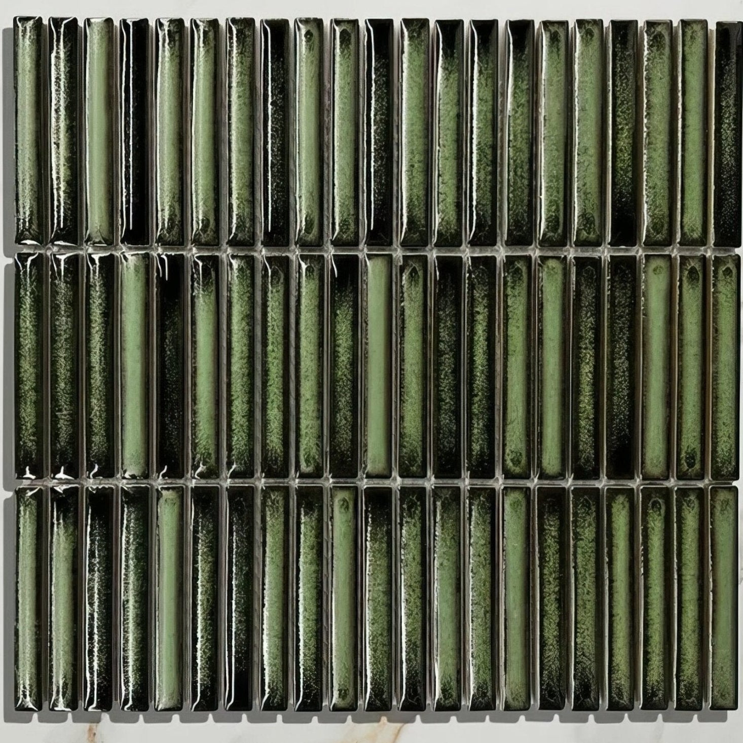 Green ceramic bamboo lustre porcelain mosaic tile with glossy textured finish and subtle black veining forest color