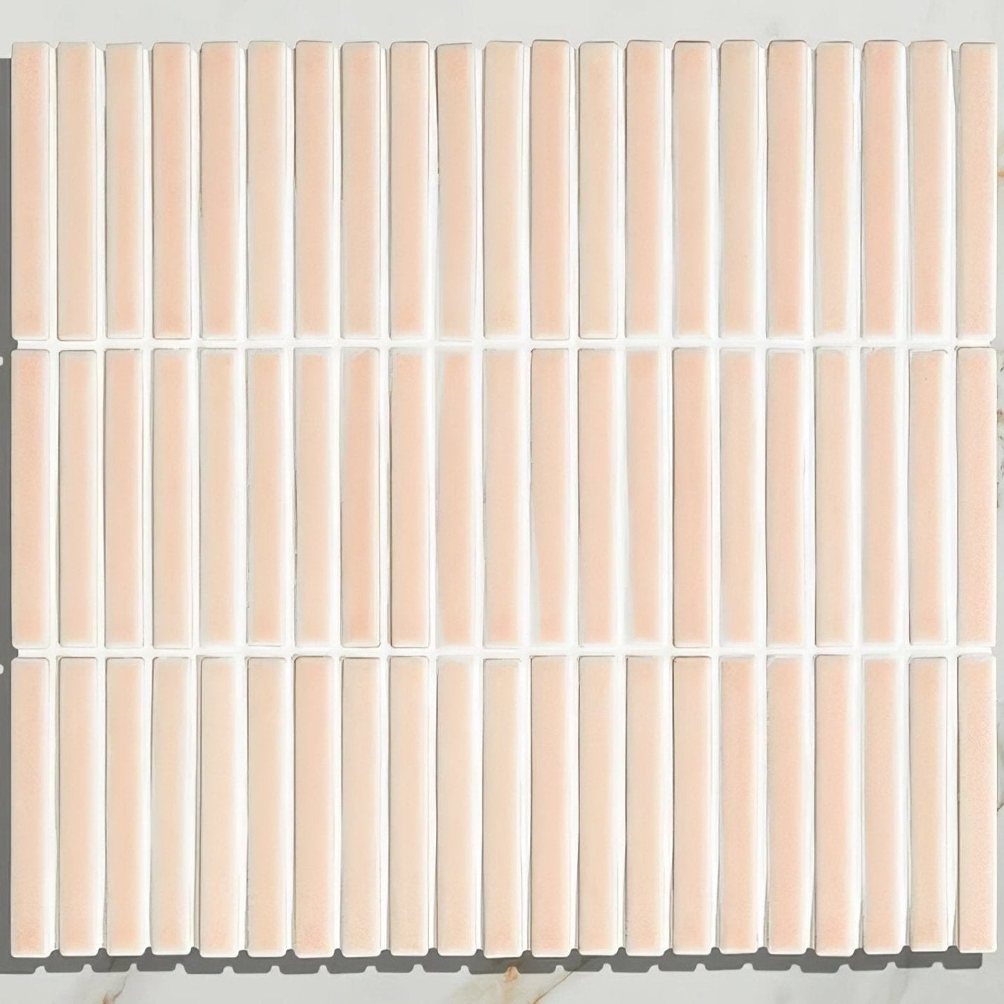 Beige rectangular bamboo porcelain mosaic tile with white grout lines in blush color for decorative surfaces