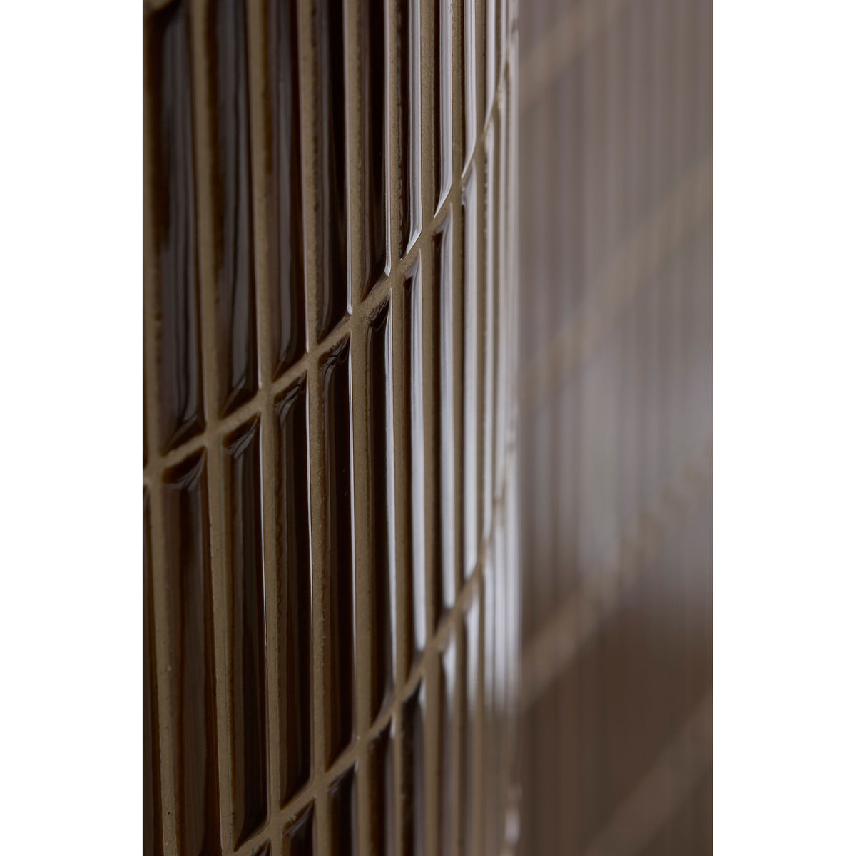 Brown ceramic tile with glossy finish and raised rectangular grid pattern in bamboo porcelain mosaic caramel design