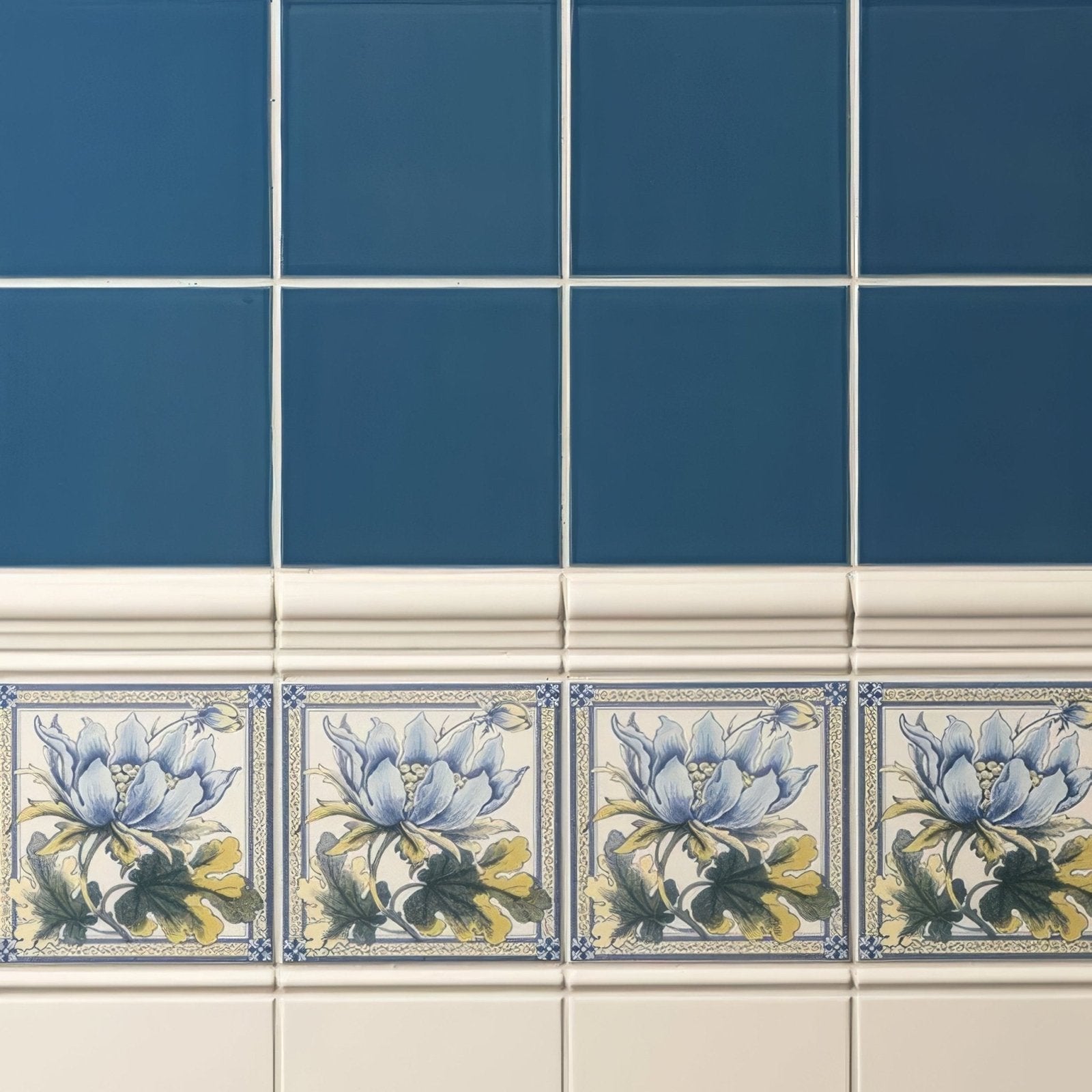 Baroque blue field tile featuring blue and white ceramic with delicate lavender yellow and green floral designs