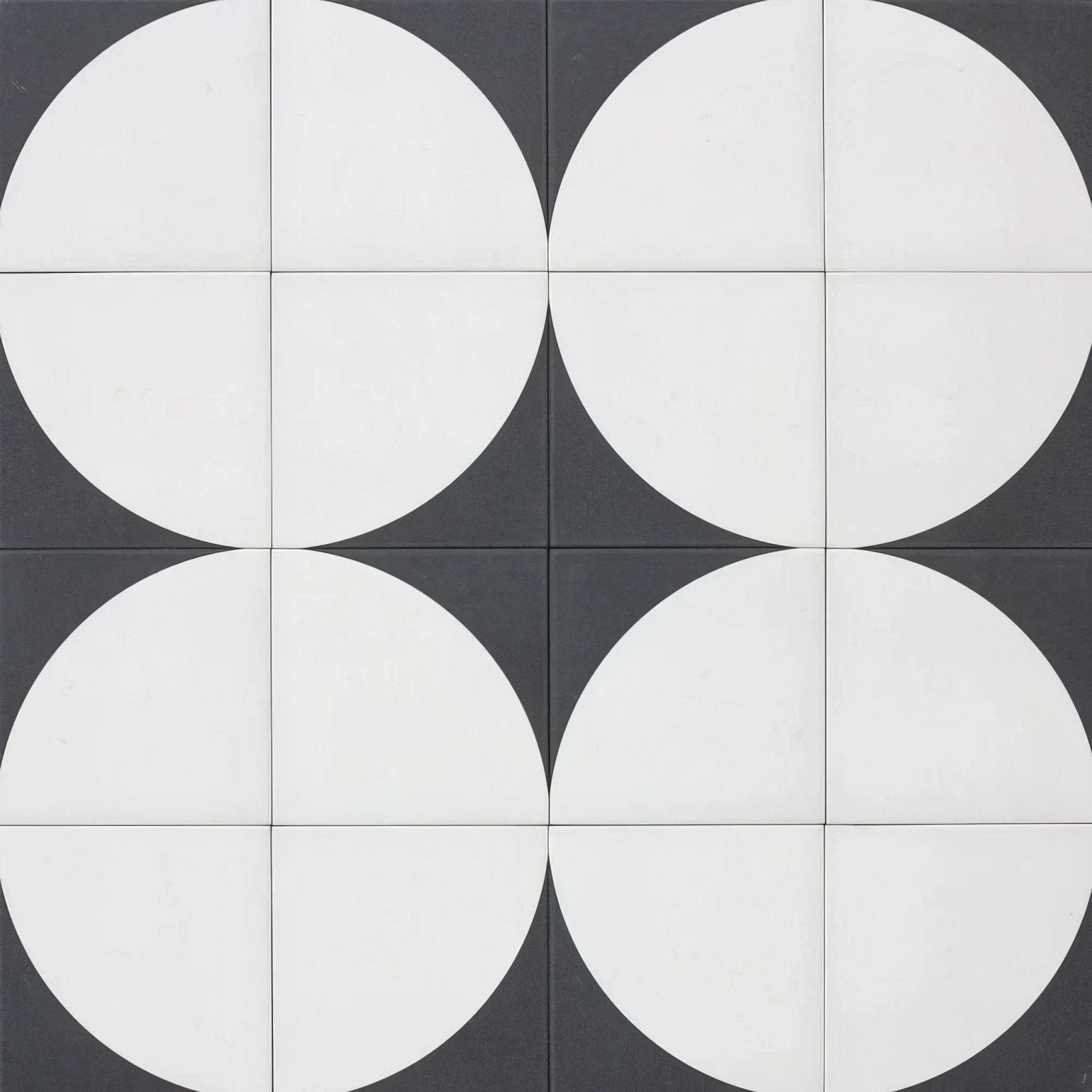 Black and white circular patterned porcelain floor tile from bert and may arco old iron collection