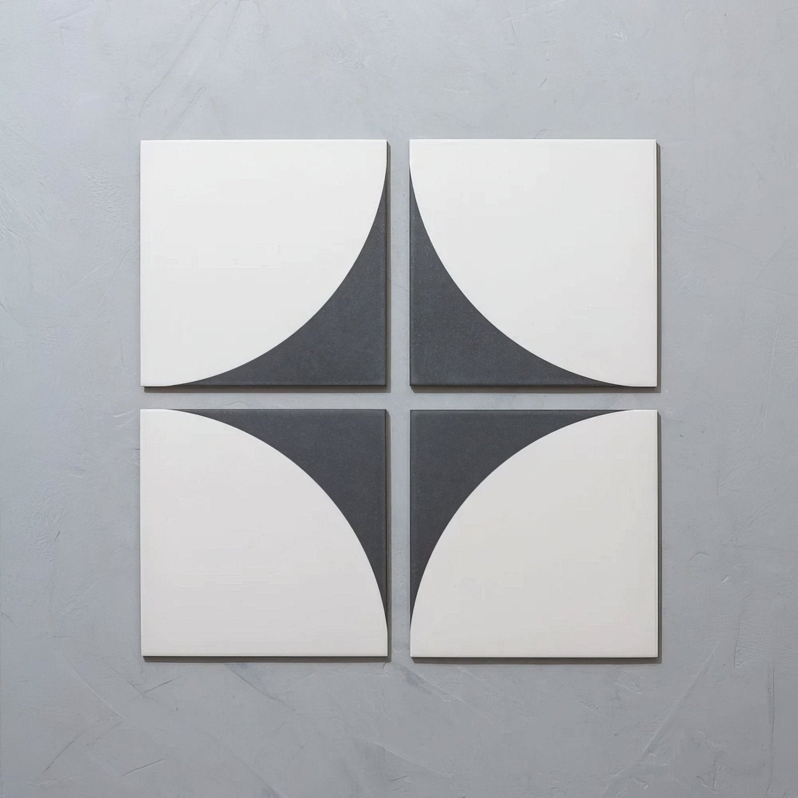 Set of four bert & may arco old iron porcelain square tiles with modern white and dark gray curved geometric design