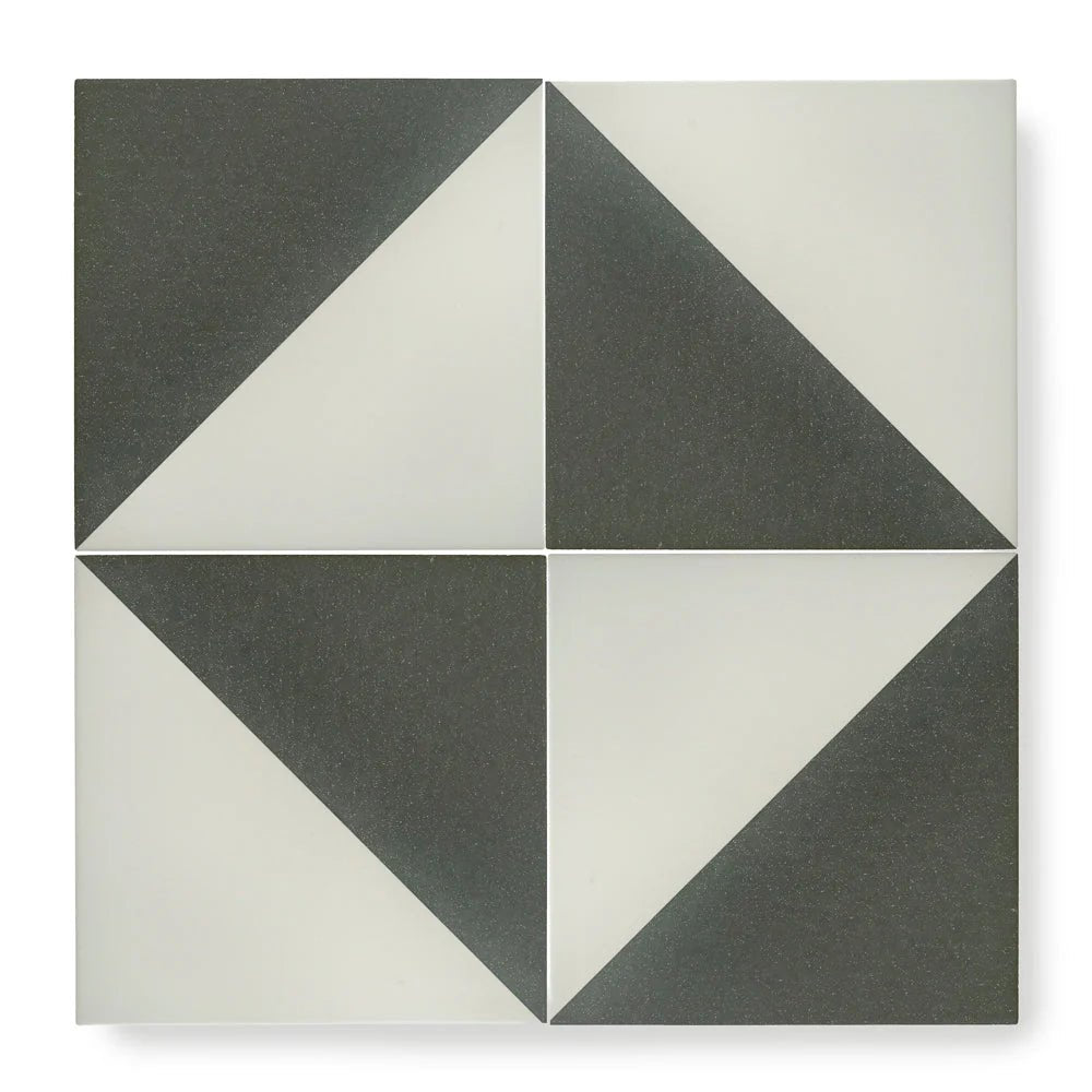 Square ceramic tile featuring a geometric pattern of dark gray and off-white triangles bert & may black alalpardo porcelain