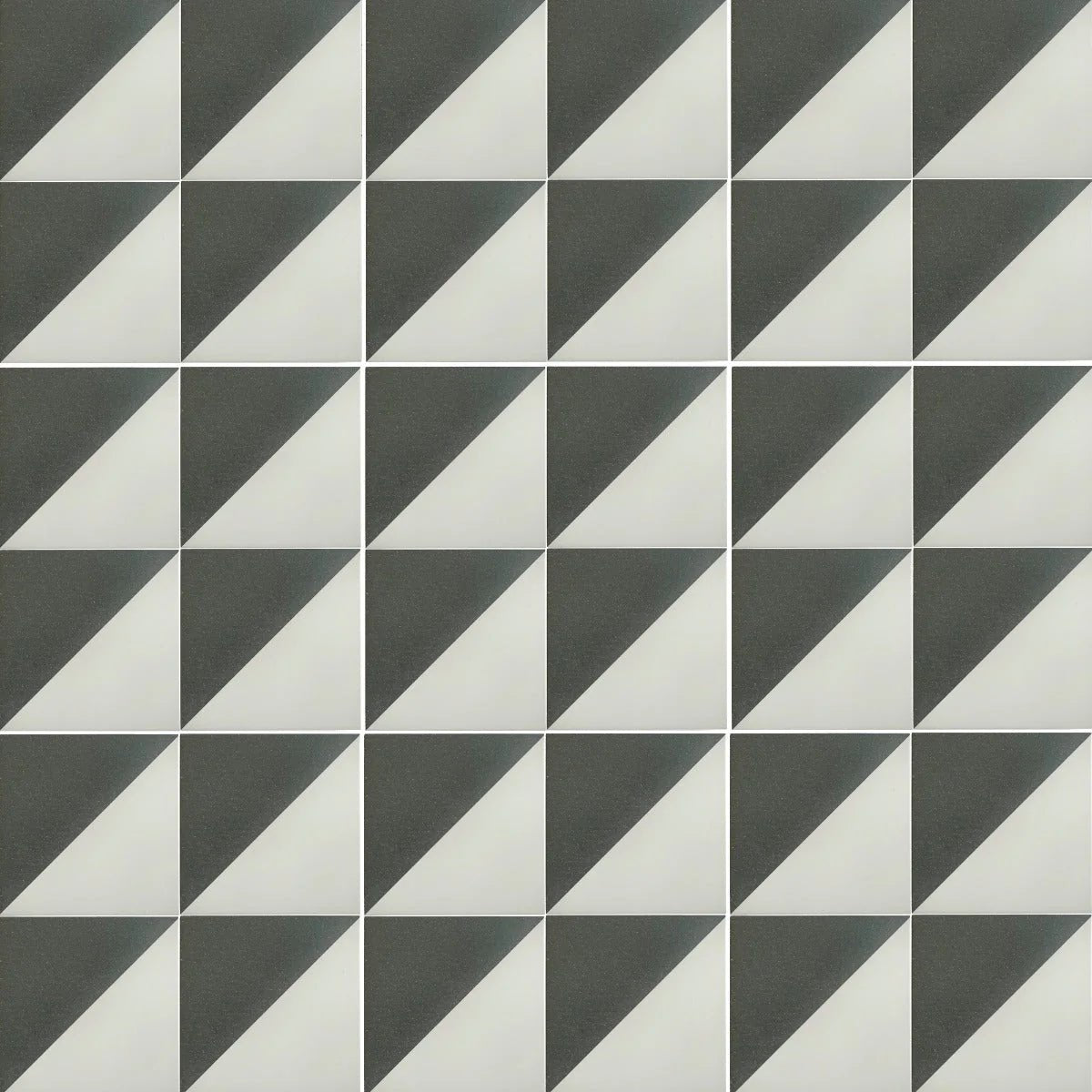 Bert & May black Alalpardo porcelain geometric tile featuring a repeating pattern of black and white triangles in a grid