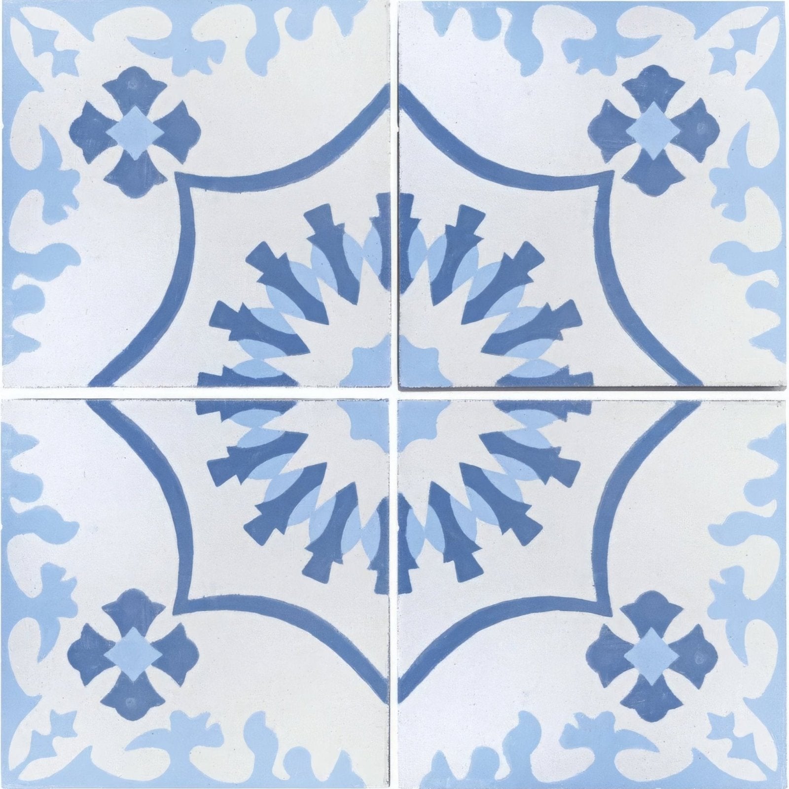 Blue and white patterned ceramic tile with symmetrical floral design from bert and may bolonia navy porcelain collection