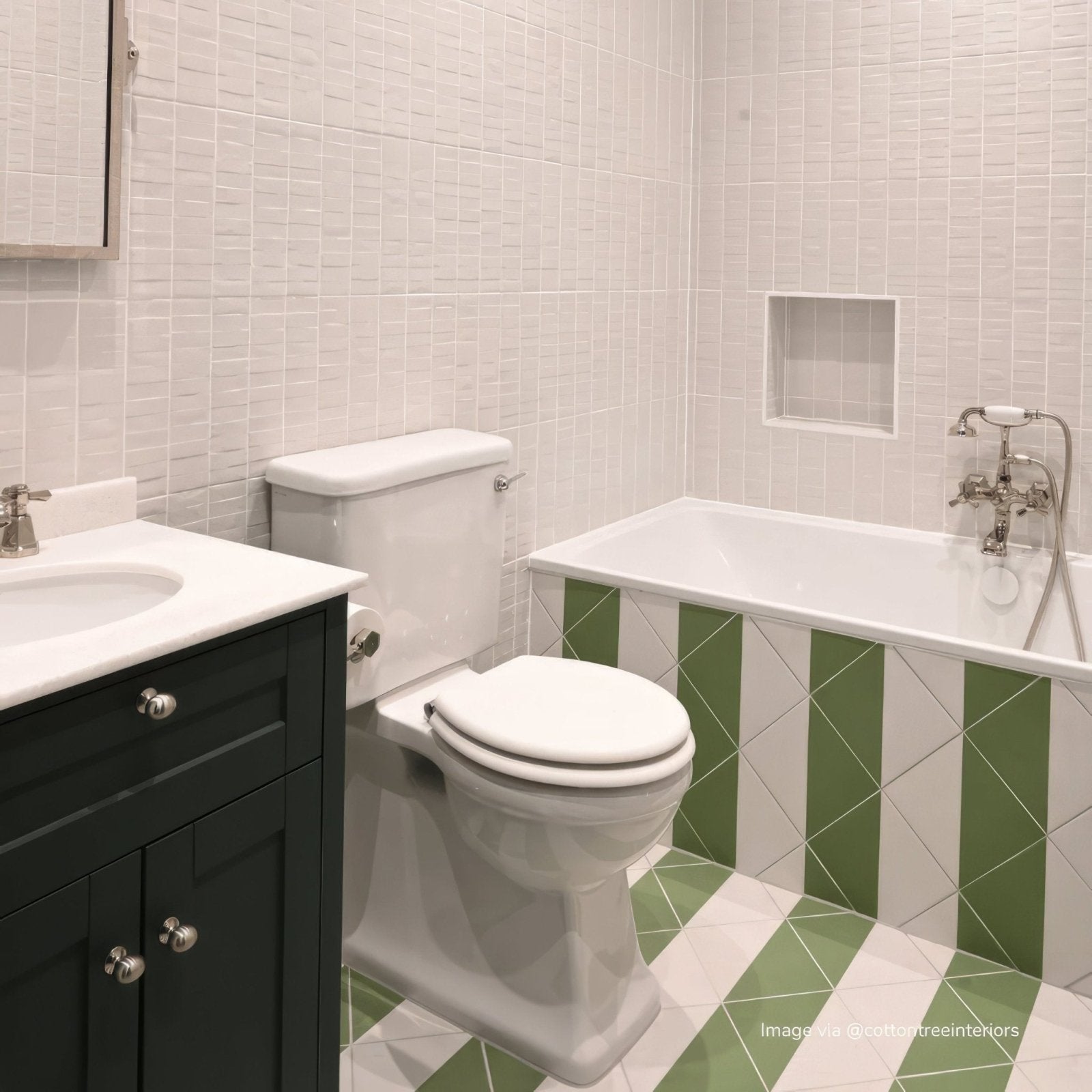 White ceramic toilet with sleek modern design and chrome flush handle from Bert & May Green Alalpardo Porcelain collection