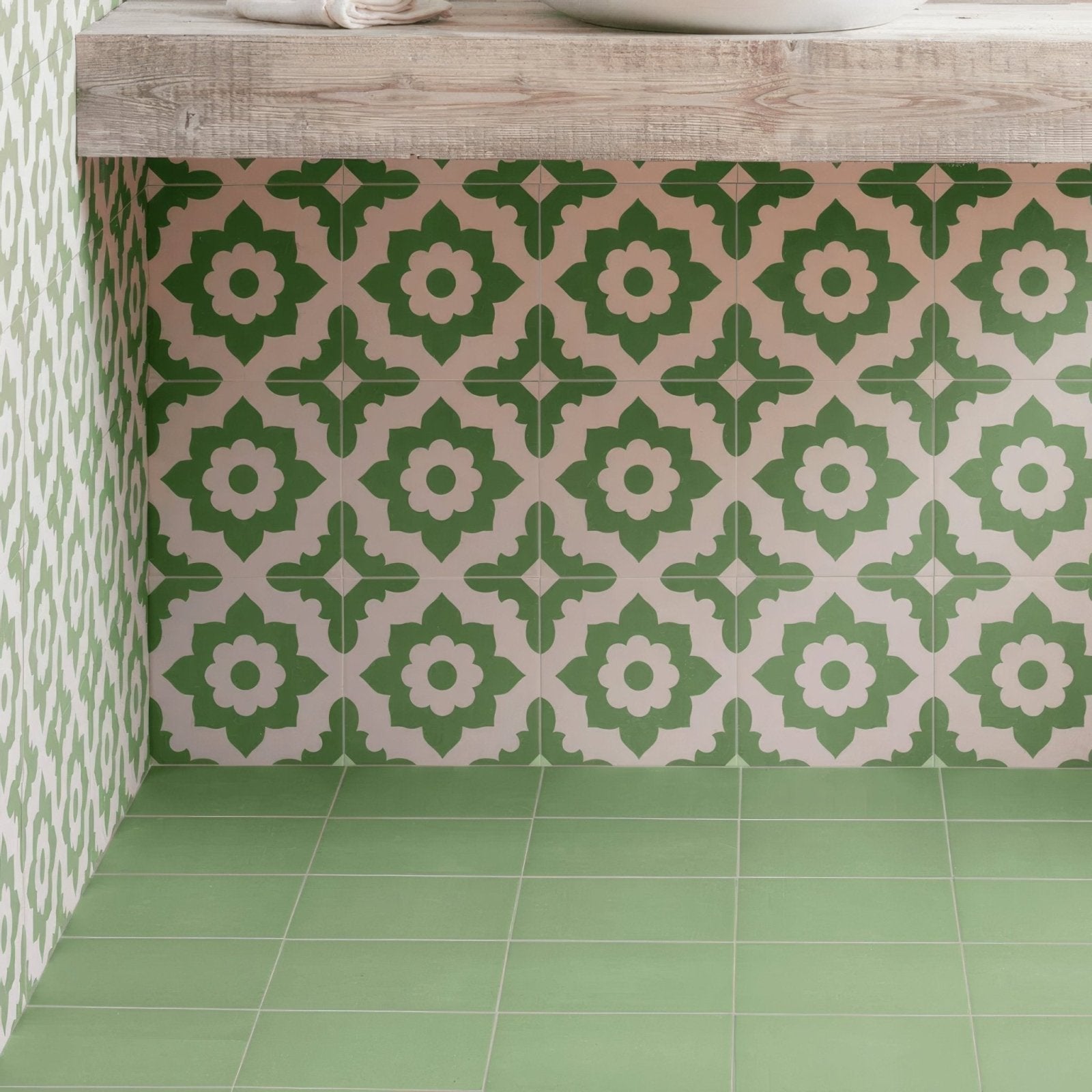 Green and cream patterned ceramic tiles with floral design from bert & may green santona porcelain collection