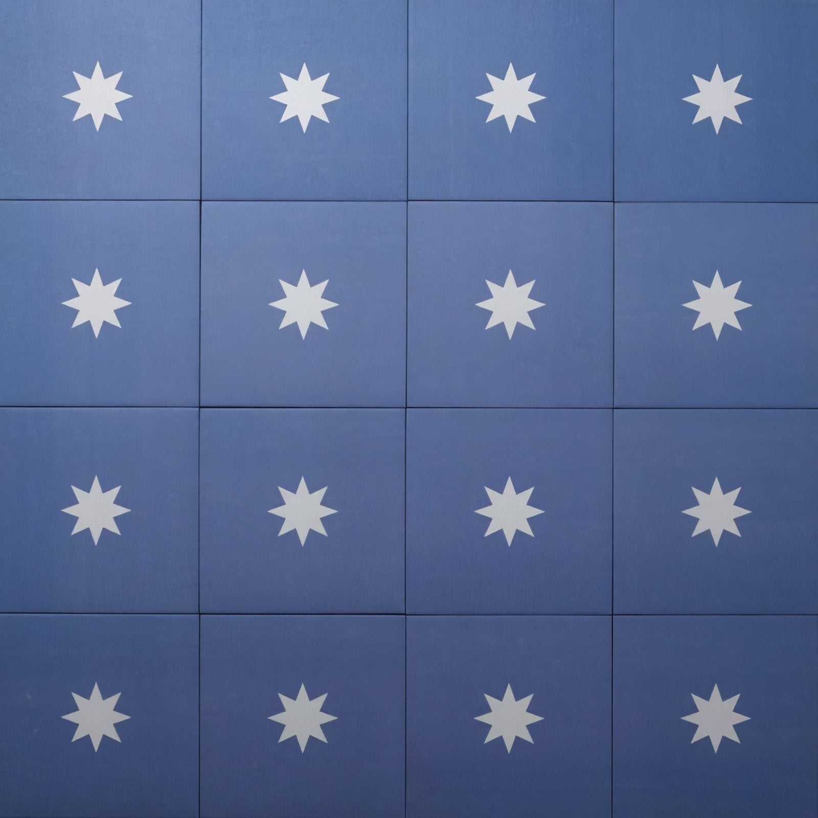 Blue square porcelain tiles with white star patterns by bert and may navy luna for decorative wall and floor use