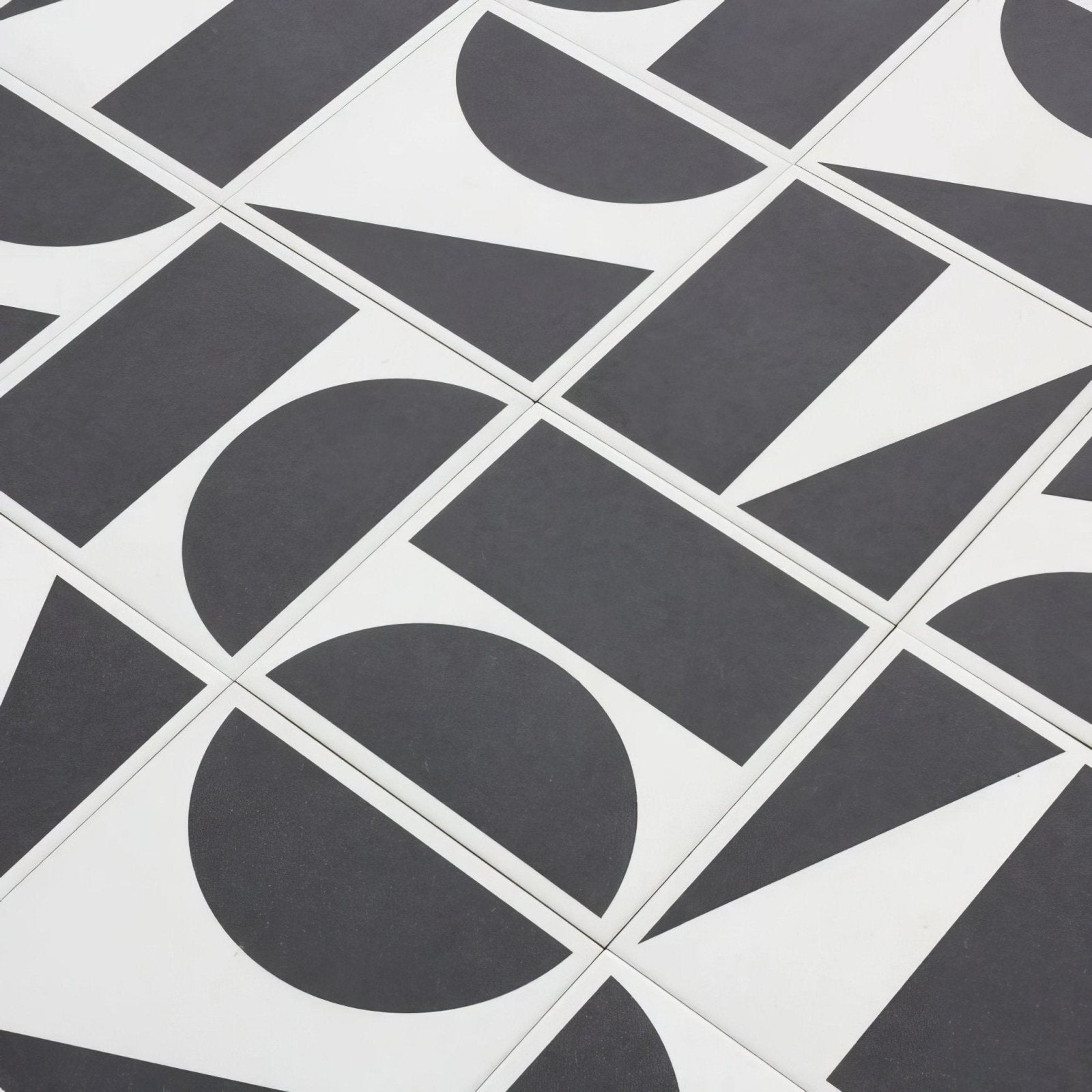Black and white geometric patterned floor tiles in bert and may split shift old iron porcelain design