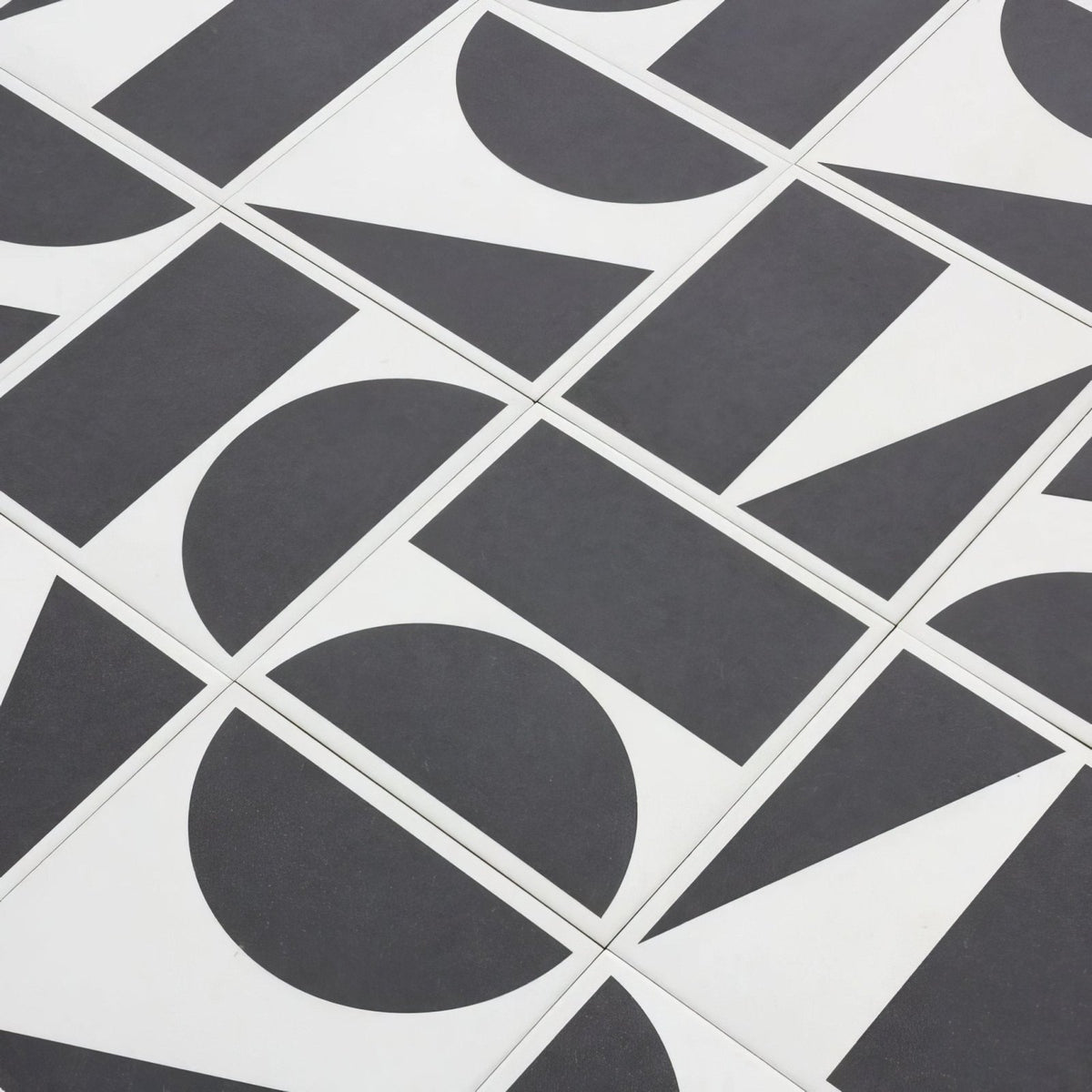 Black and white geometric patterned floor tiles in bert and may split shift old iron porcelain design
