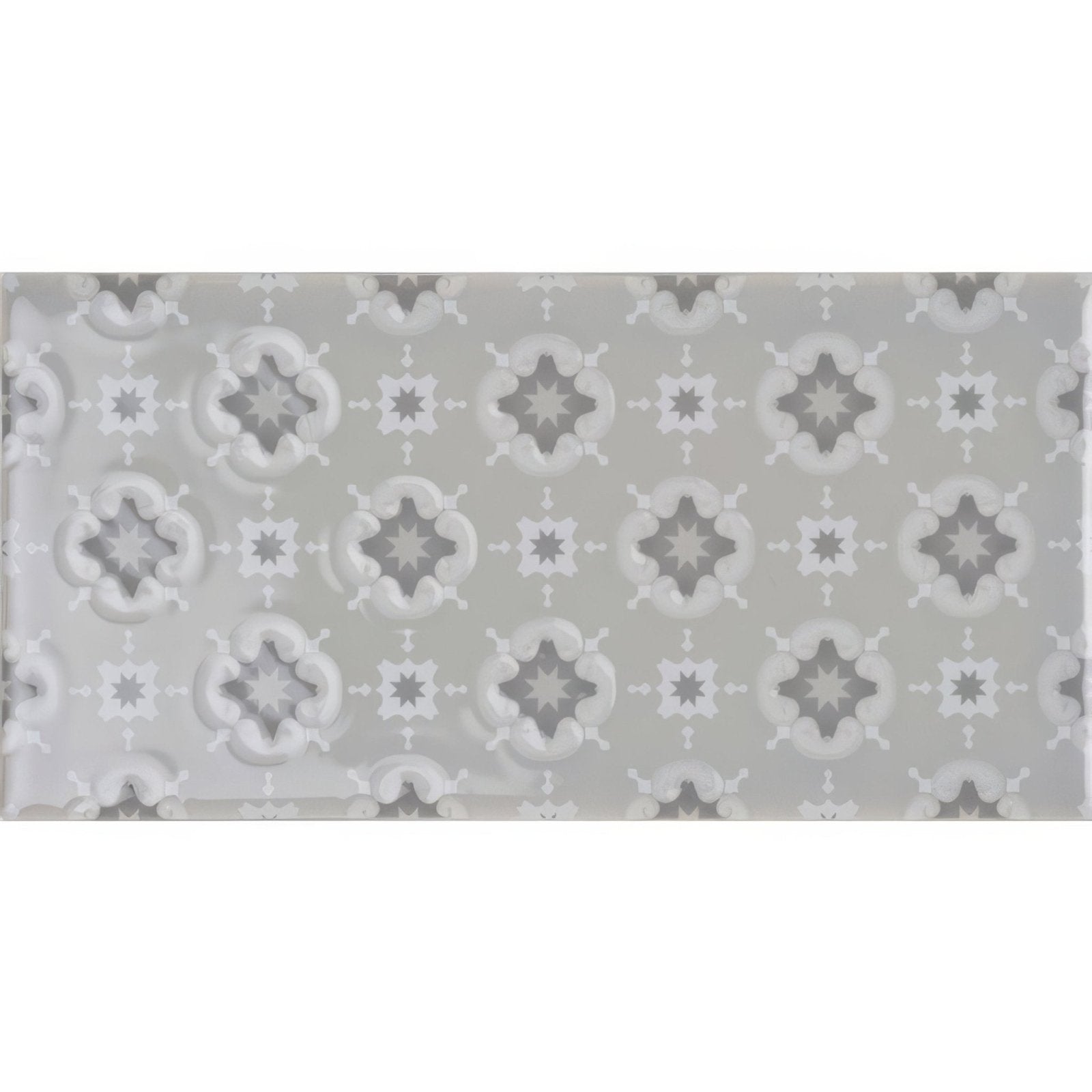 Gray rectangular tile bicton on dunwich with raised star-shaped motifs in varying gray shades for decorative use