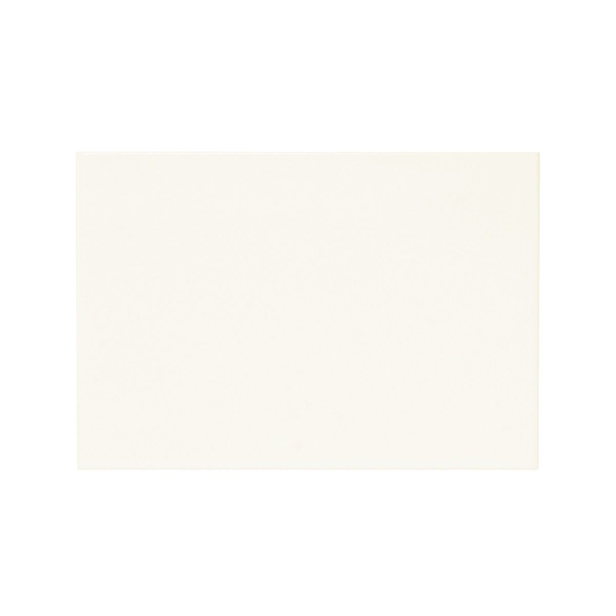 Cream-colored rectangular placemat made of matt white material for dining and table setting use
