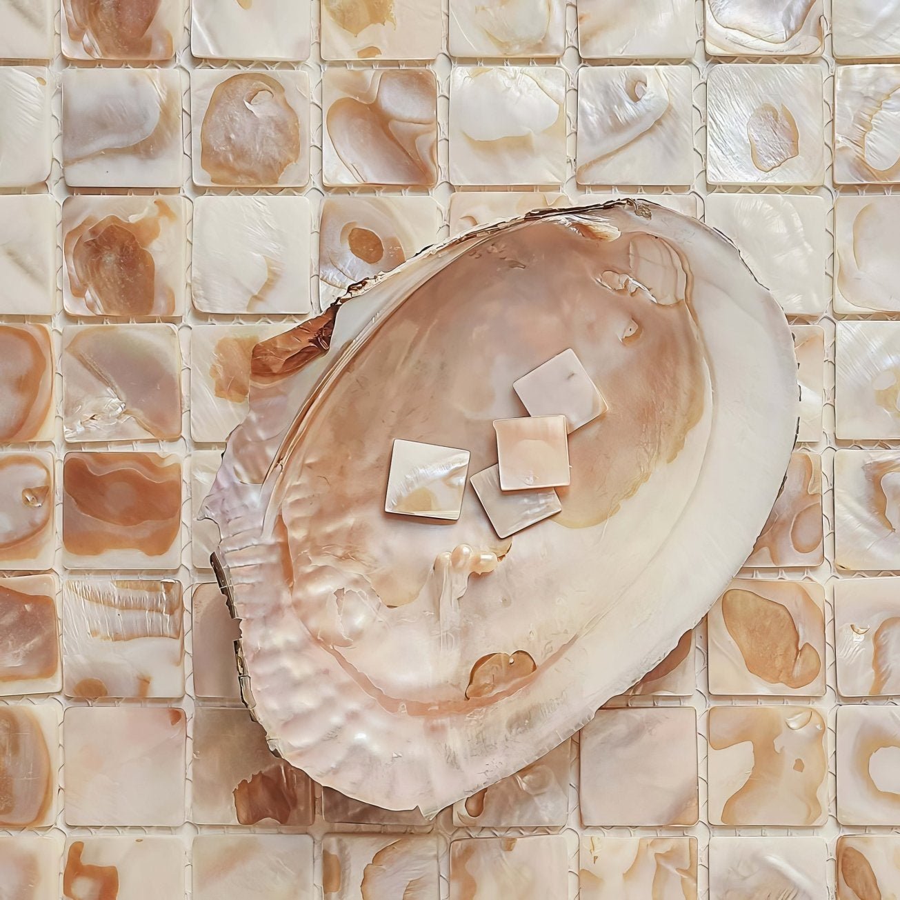 Biscotti 25mm square natural iridescent mother-of-pearl oyster shell with smooth interior and subtle brownish-pink veining
