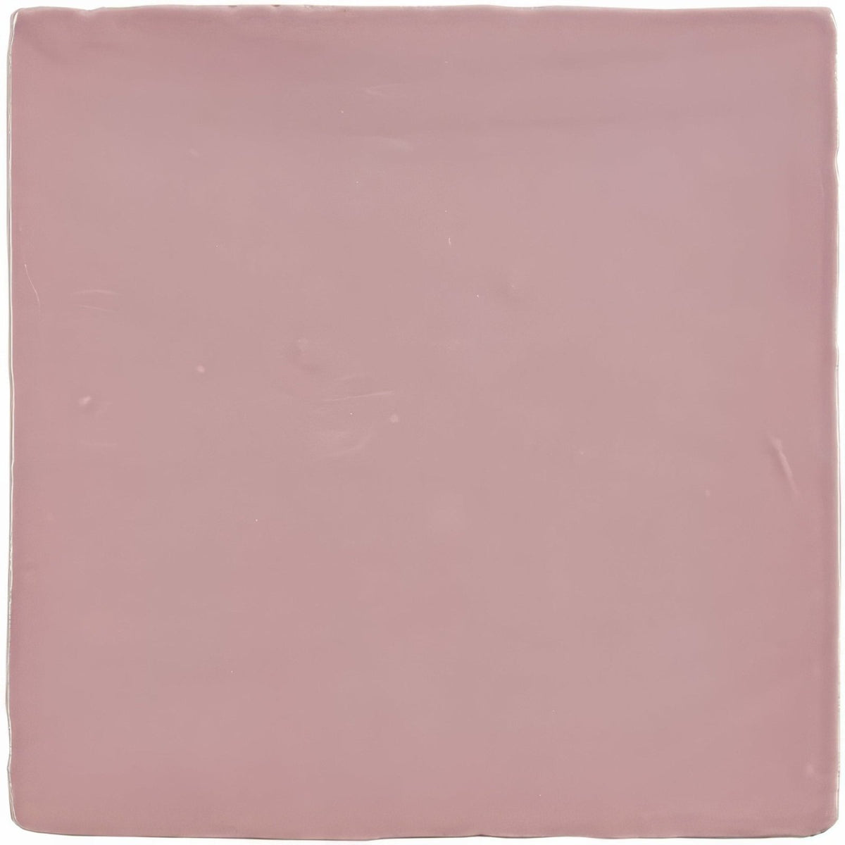 A square matte ceramic tile in soft dusty rose from the blossom field tile collection