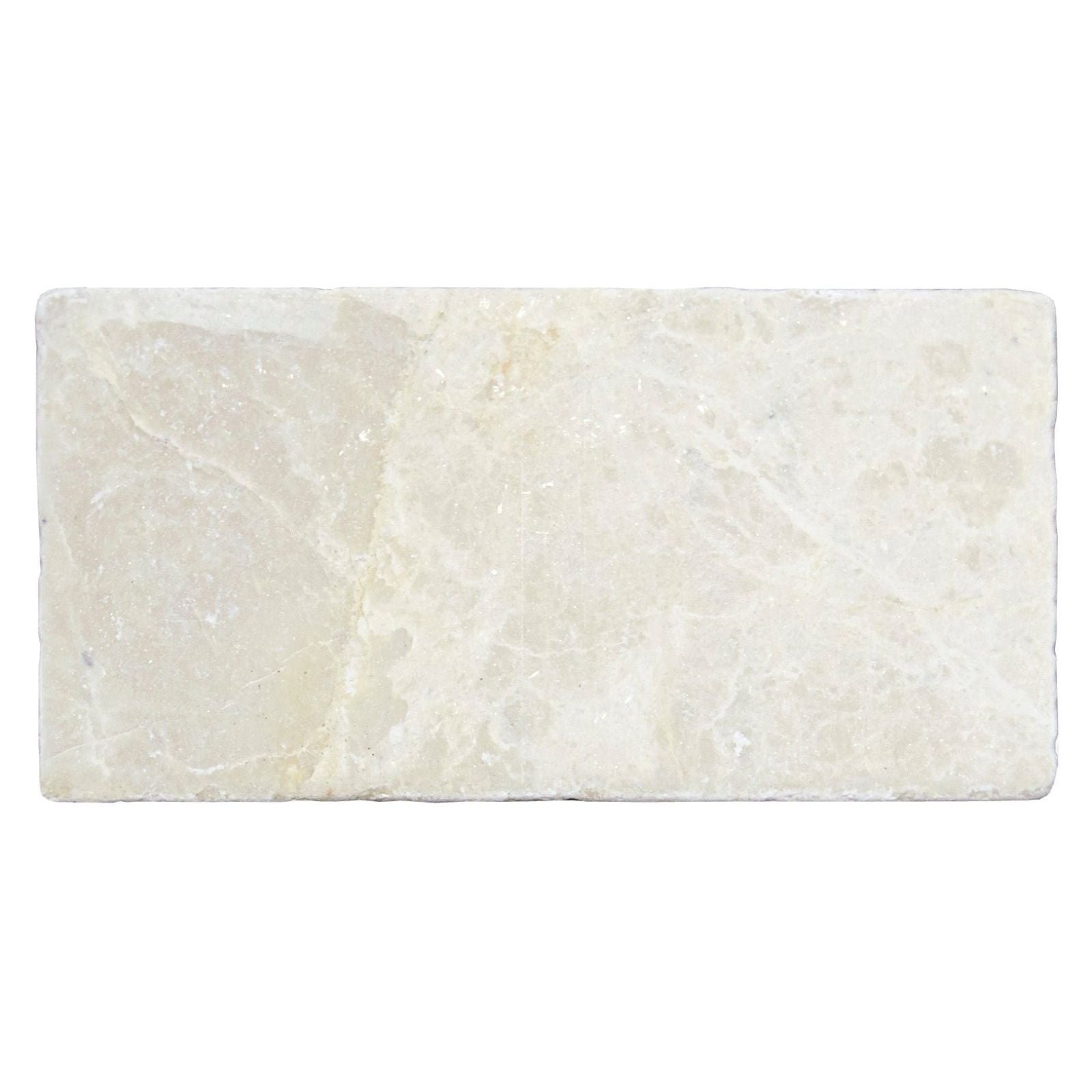 Cream-colored Bottocino tumbled marble rectangular tile 150 x 75mm with natural veining and textured surface
