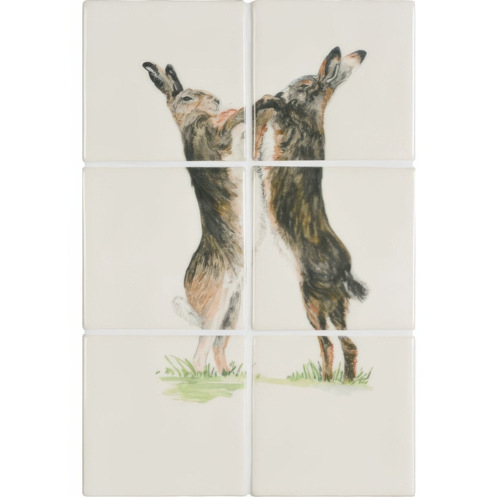 Cream-colored ceramic tile panel featuring two detailed brown and gray hares in upright boxing pose on off-white background