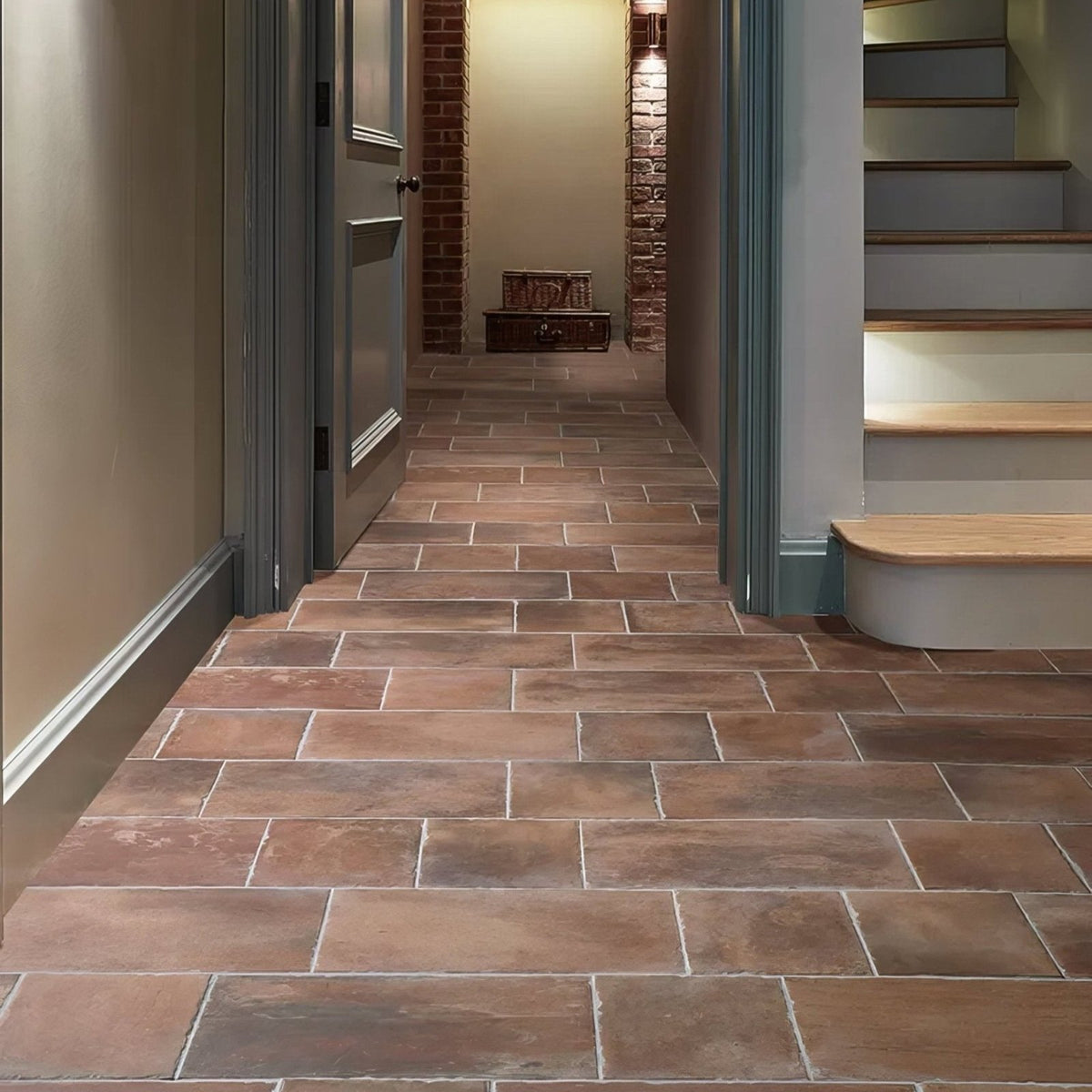 Brewhouse porcelain rectangle floor tiles in terracotta color with a rustic textured finish for indoor use