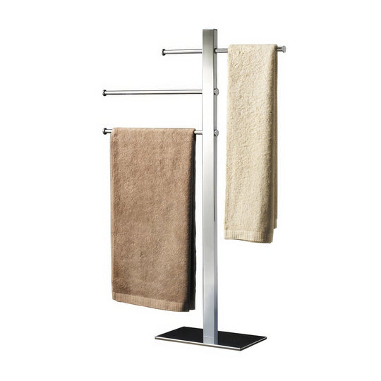 Modern chrome-finished bridge towel stand with three horizontal bars holding a beige and tan textured bath towel