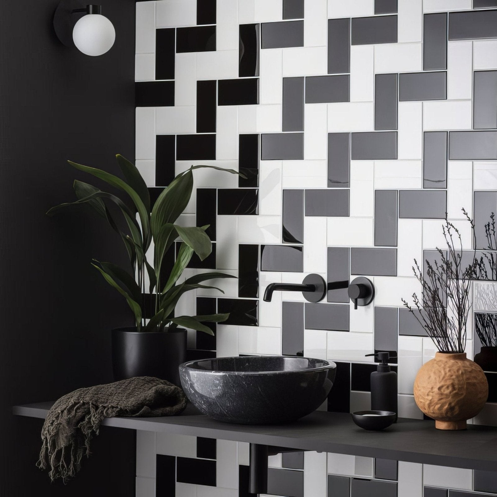 Black marble bowl sink with brilliant white half tile backdrop showcasing sleek bathroom design features
