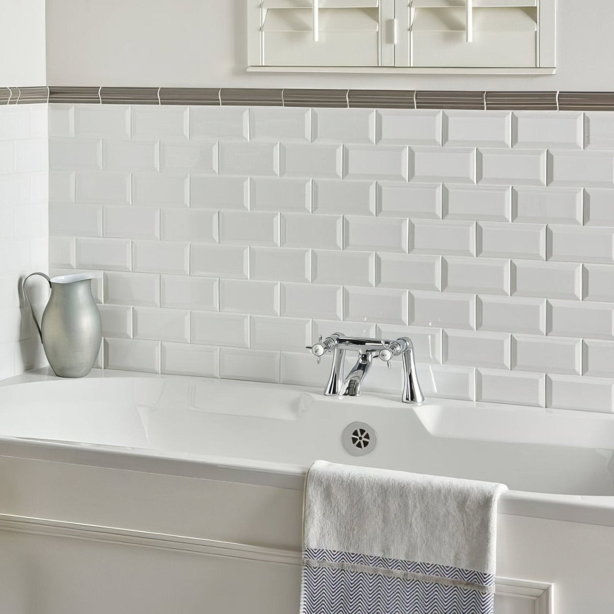 Brilliant white metro bevelled tile with a subtle textured finish for white subway tile backsplash use